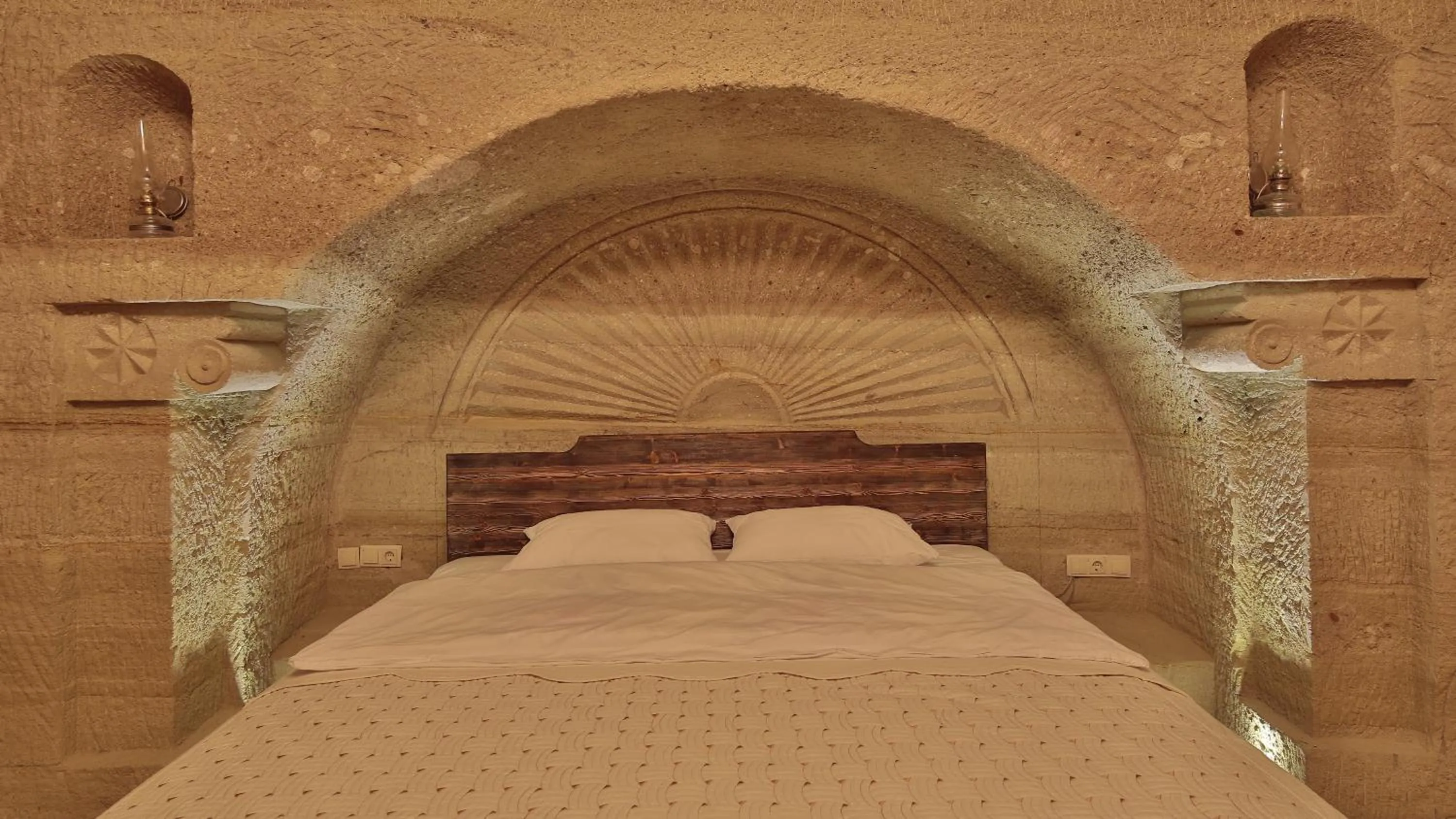 Bedroom, Bed in Family Cave Suite Hotel