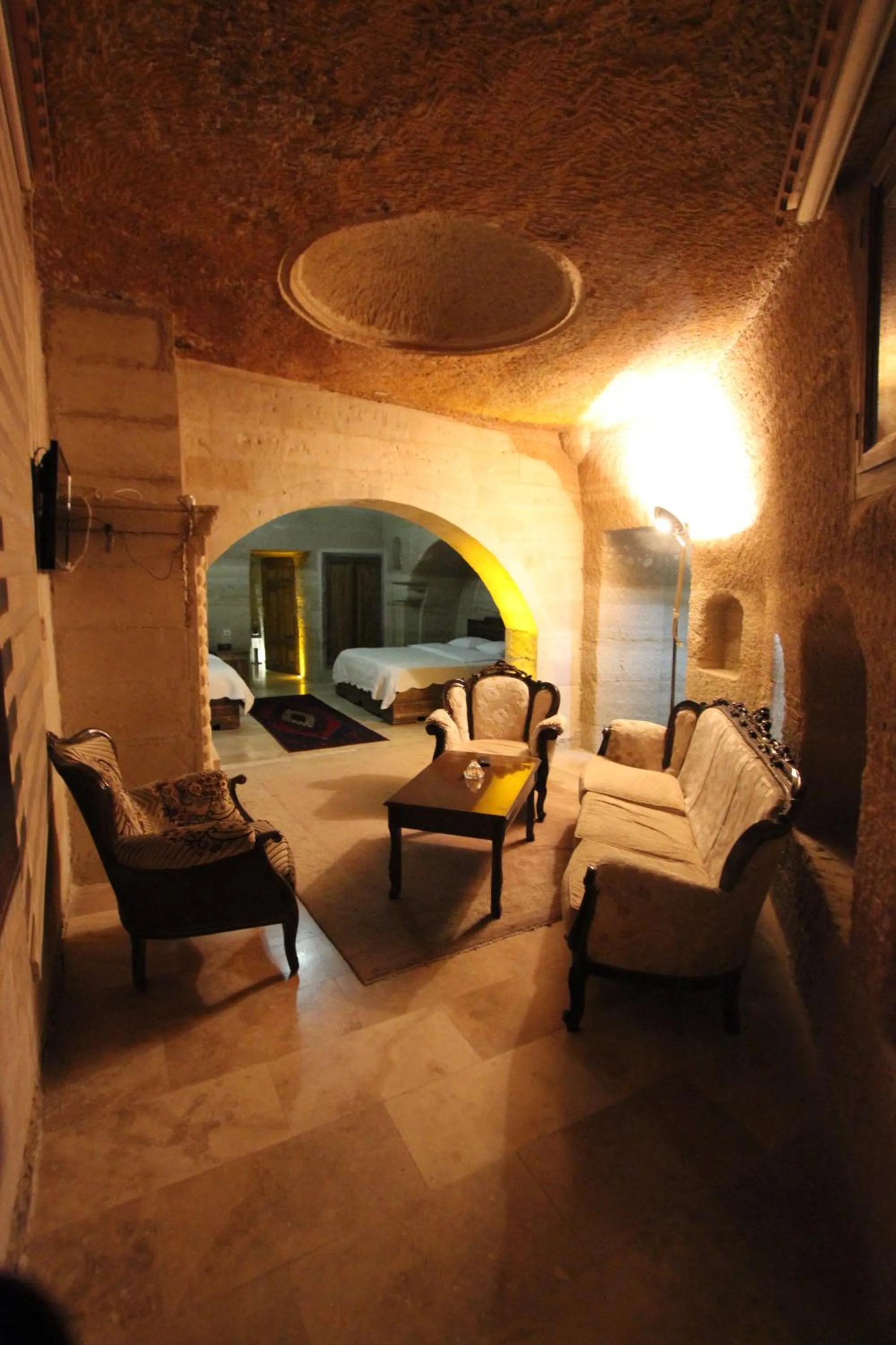Seating area in Family Cave Suite Hotel