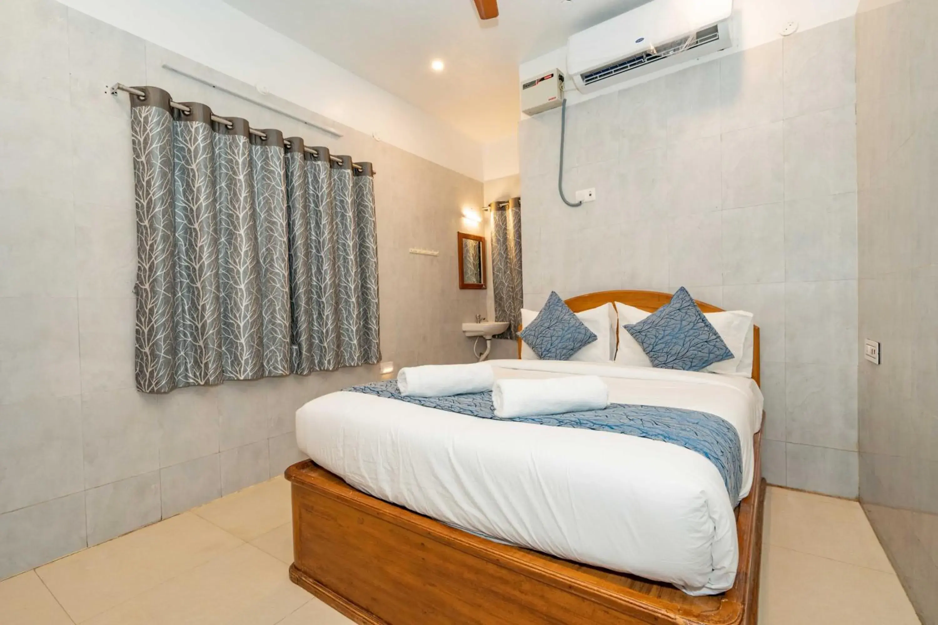 Bed in Hotel Arya Grand Rameswaram by Nimalan Bed in Hotel Arya Grand Rameswaram by Nimalan