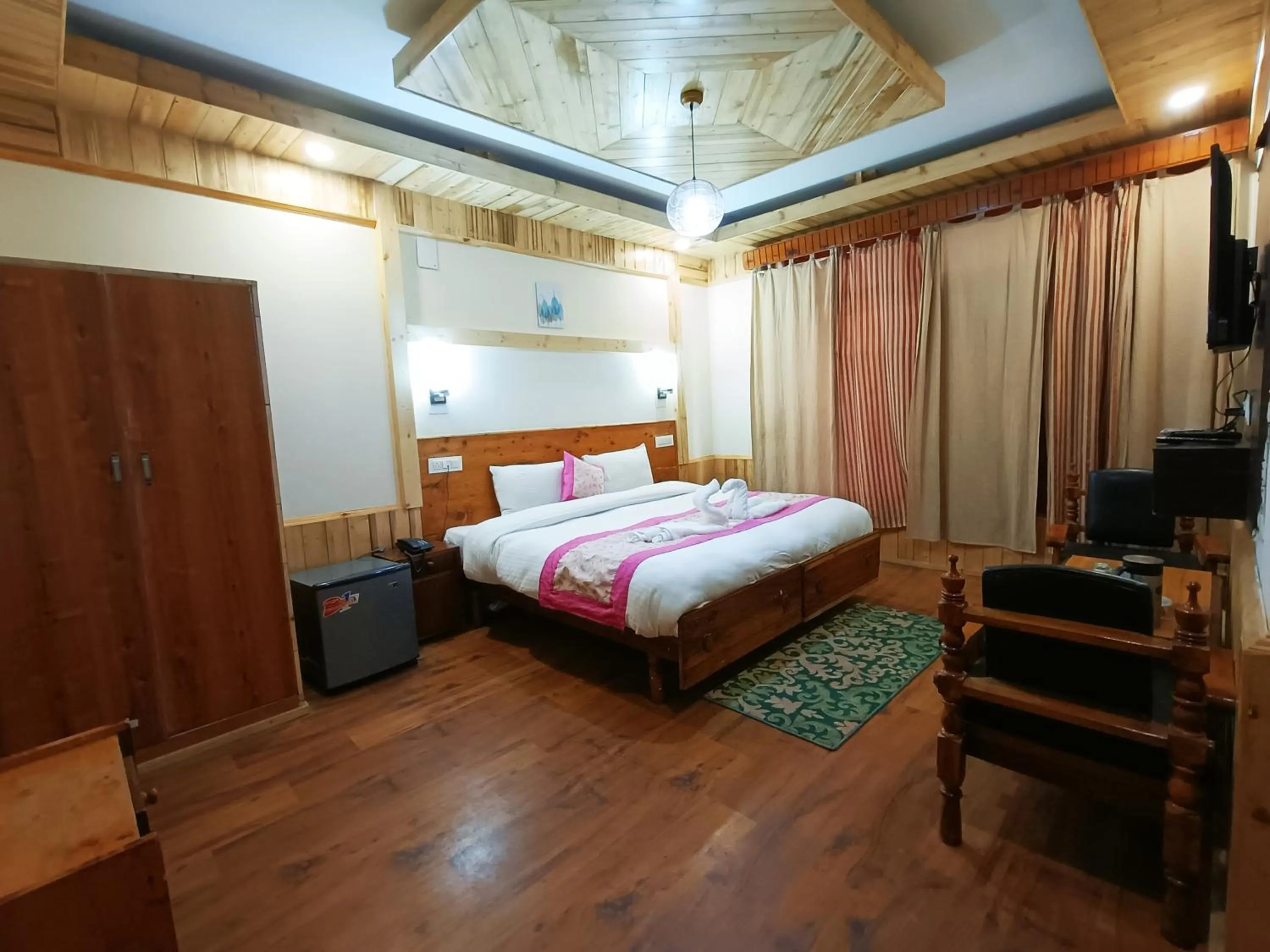 Bed in CS Shhandella Hotel