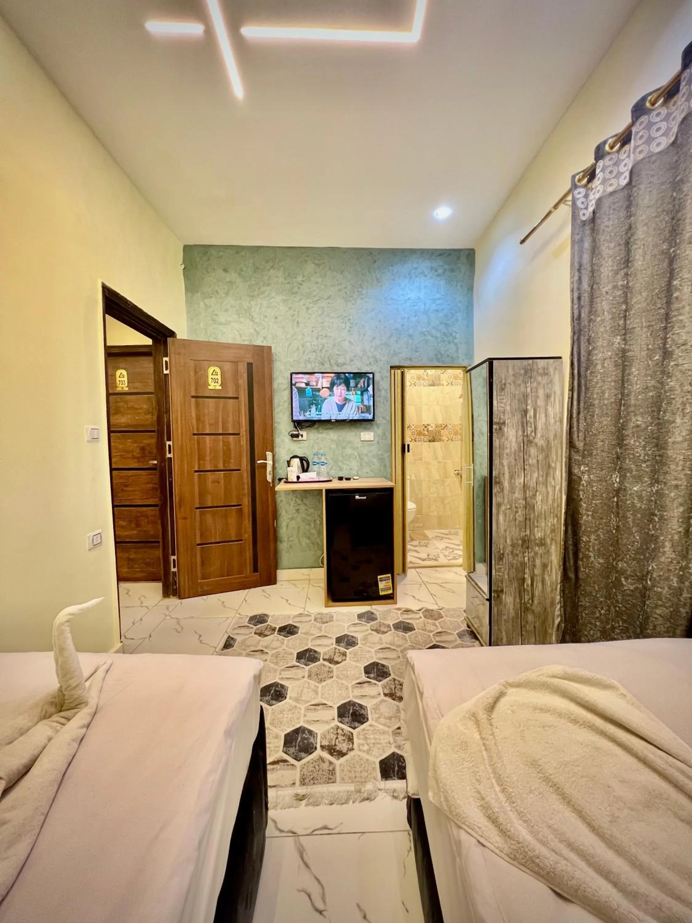 Bed in Farsha Pyramids Inn