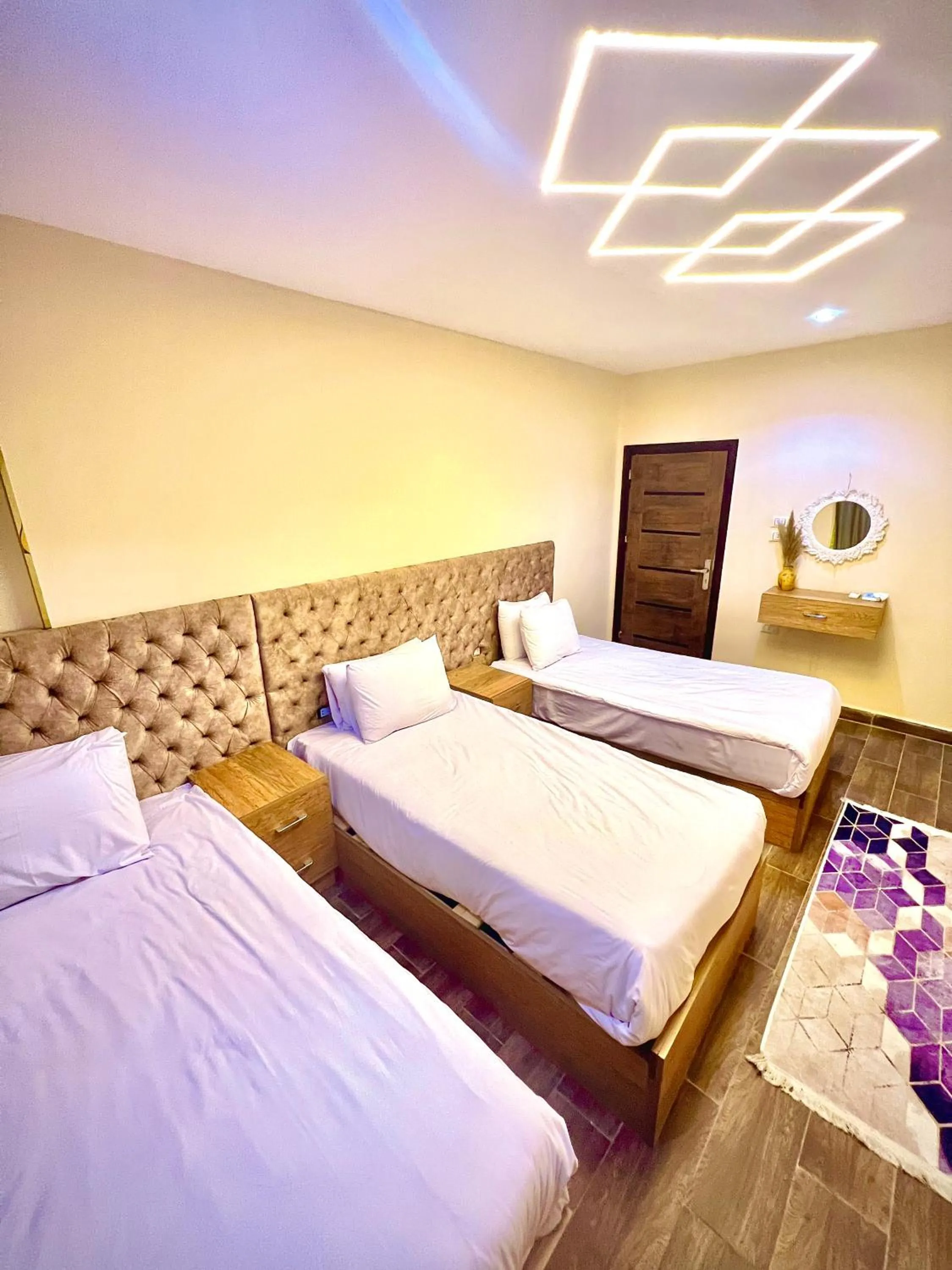 Bed in Farsha Pyramids Inn