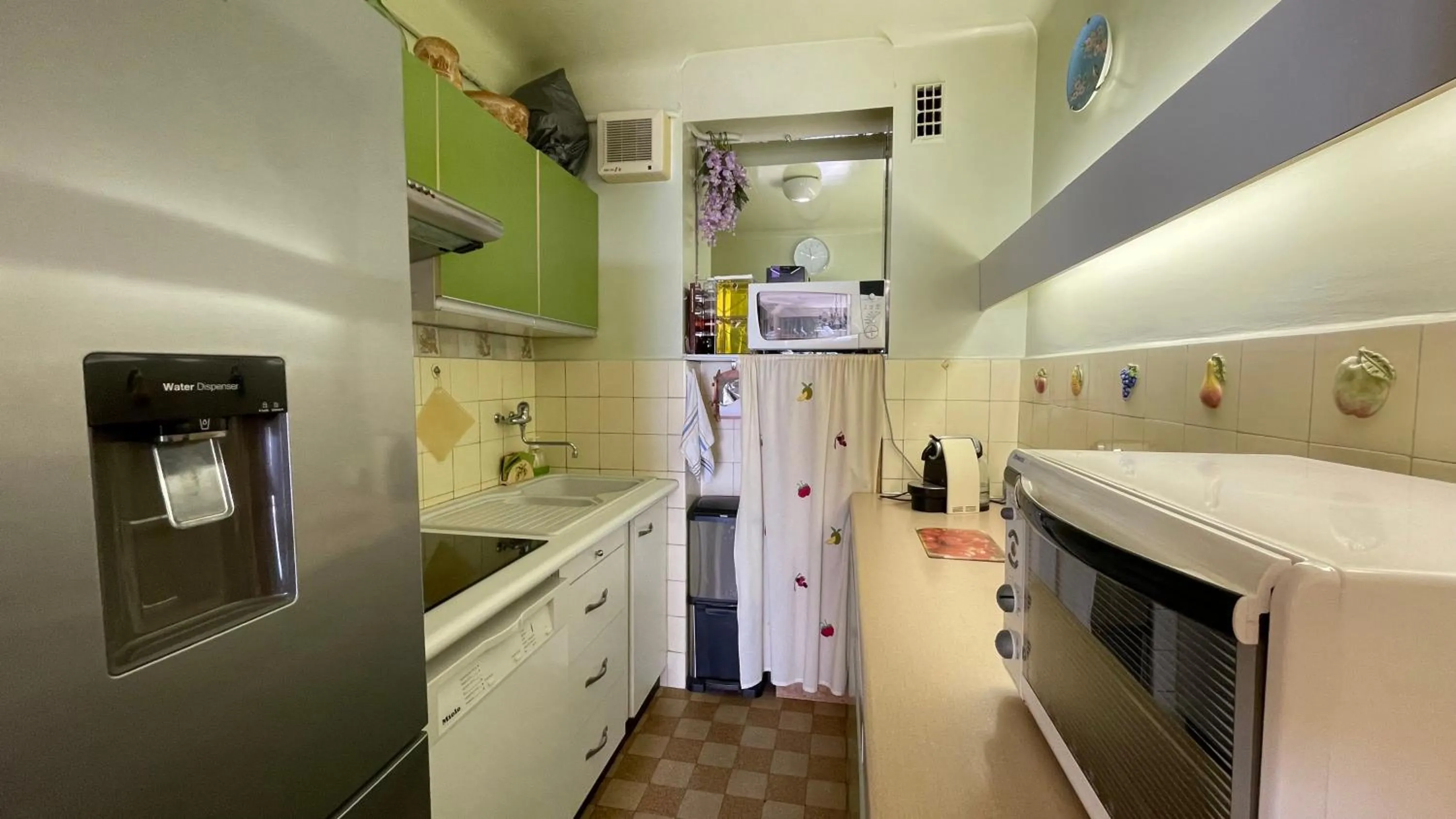 kitchen in Charming Apartment with seaview