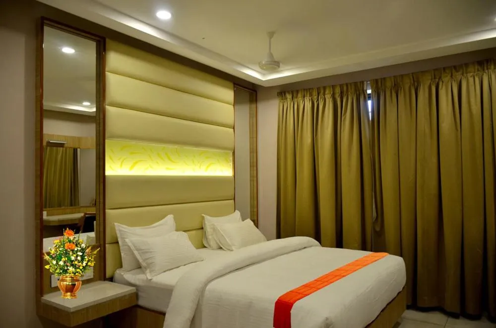 Bedroom in Dwarka Palace Luxury Hotel