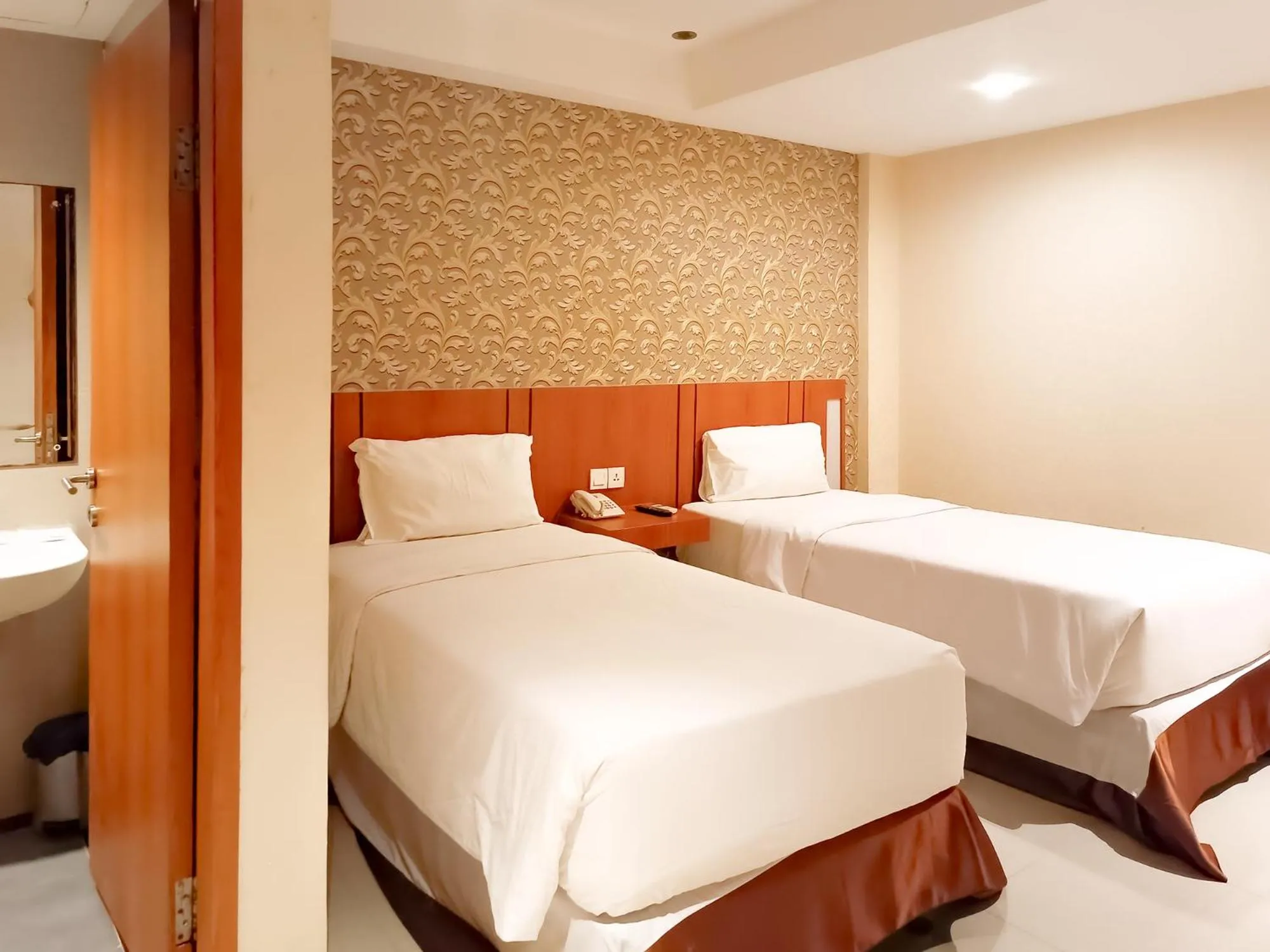 Bed in Portola Arabia Hotel Banda Aceh