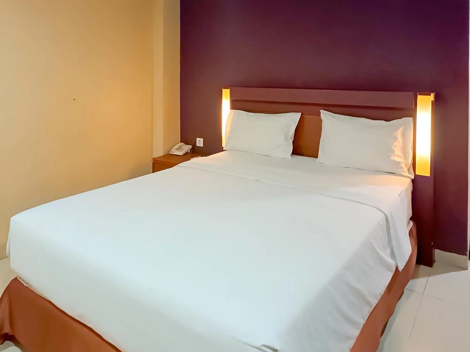 Bed in Portola Arabia Hotel Banda Aceh