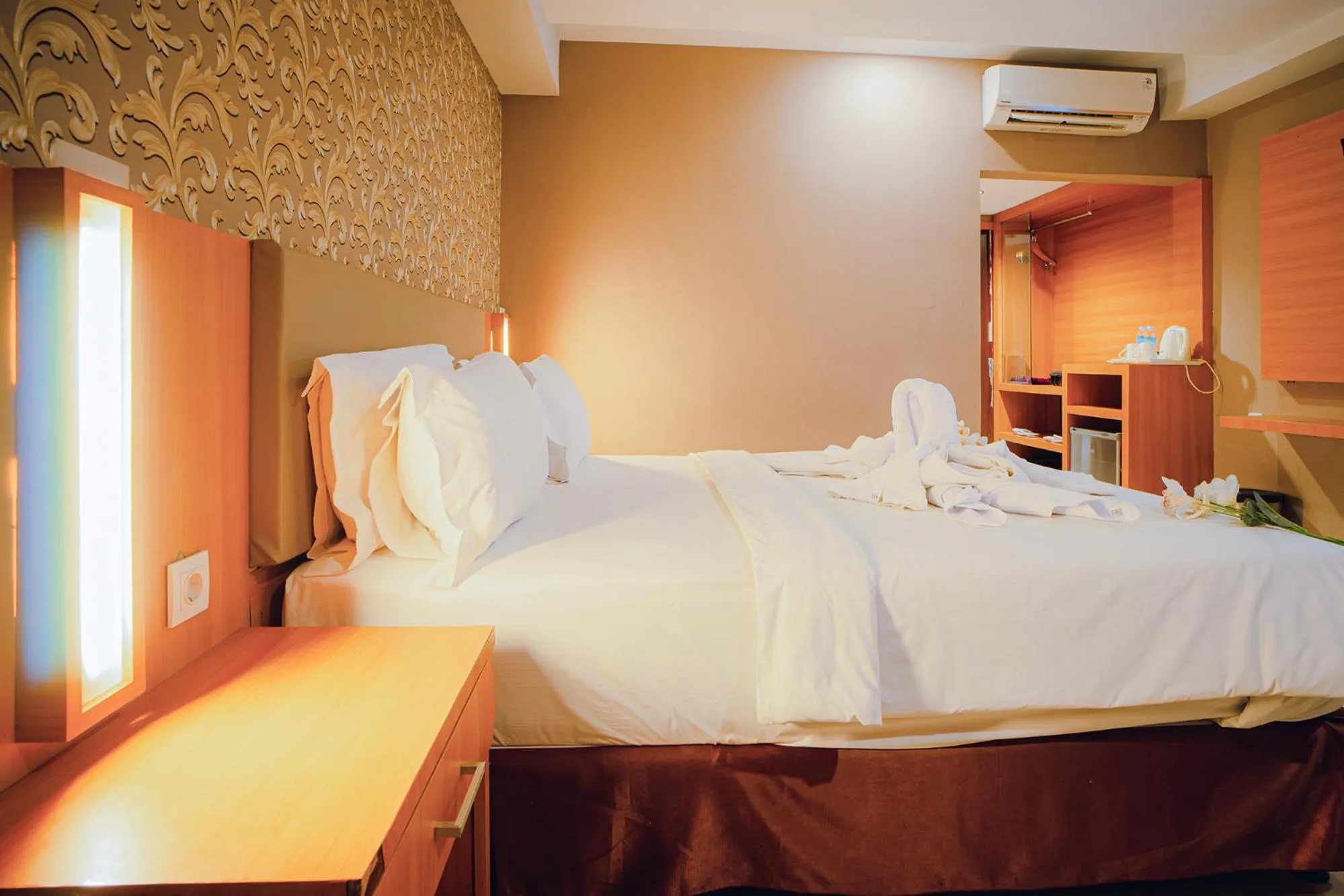 Bed in Portola Arabia Hotel Banda Aceh