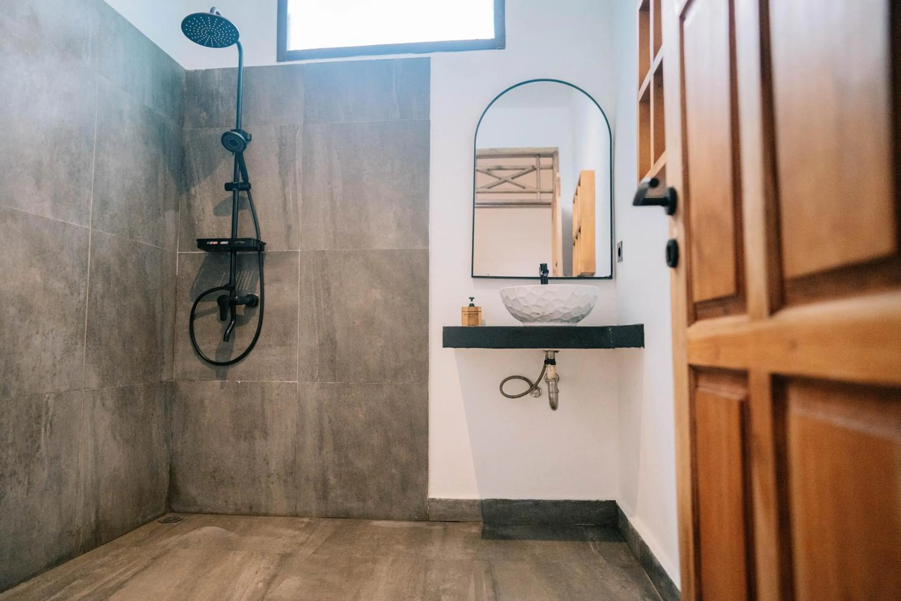 Bathroom in The Confidential Mandalika - Sea Front Hotel - New Starlink 70Mbps WiFi - Free Gym Access