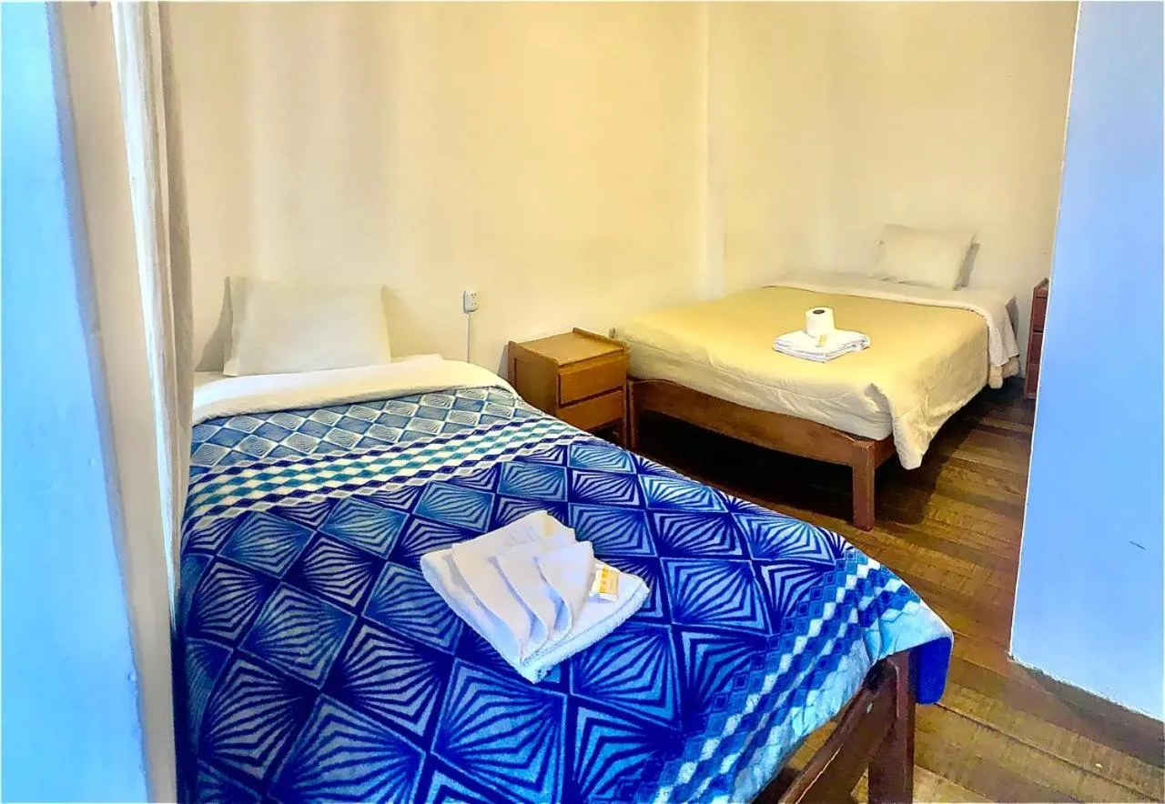 Bed in Casa Cusco guest house