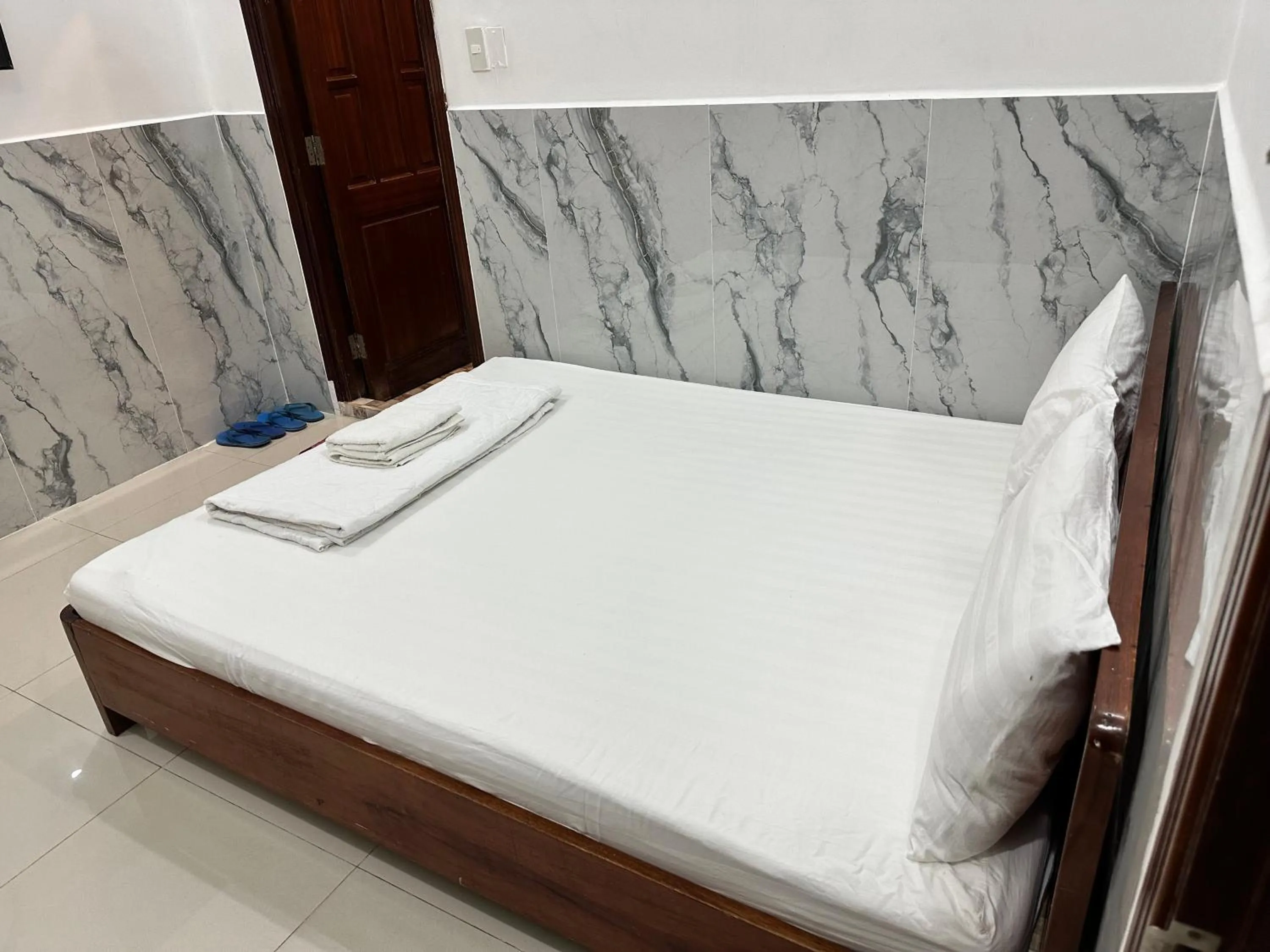 Bed in Anh Thư Motel