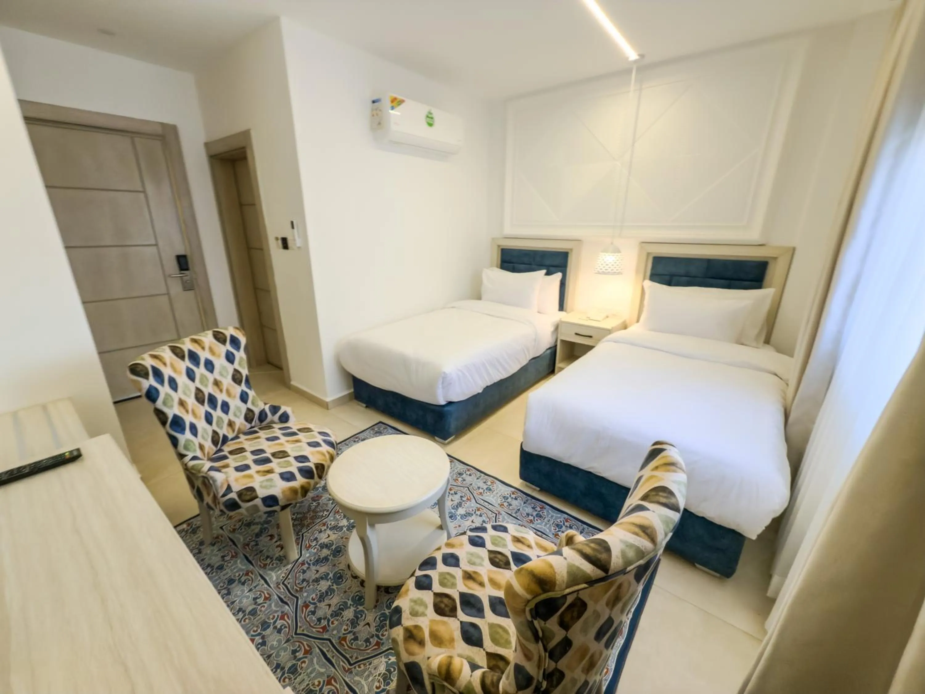 Seating area, Bed in Petra Karam Hotel
