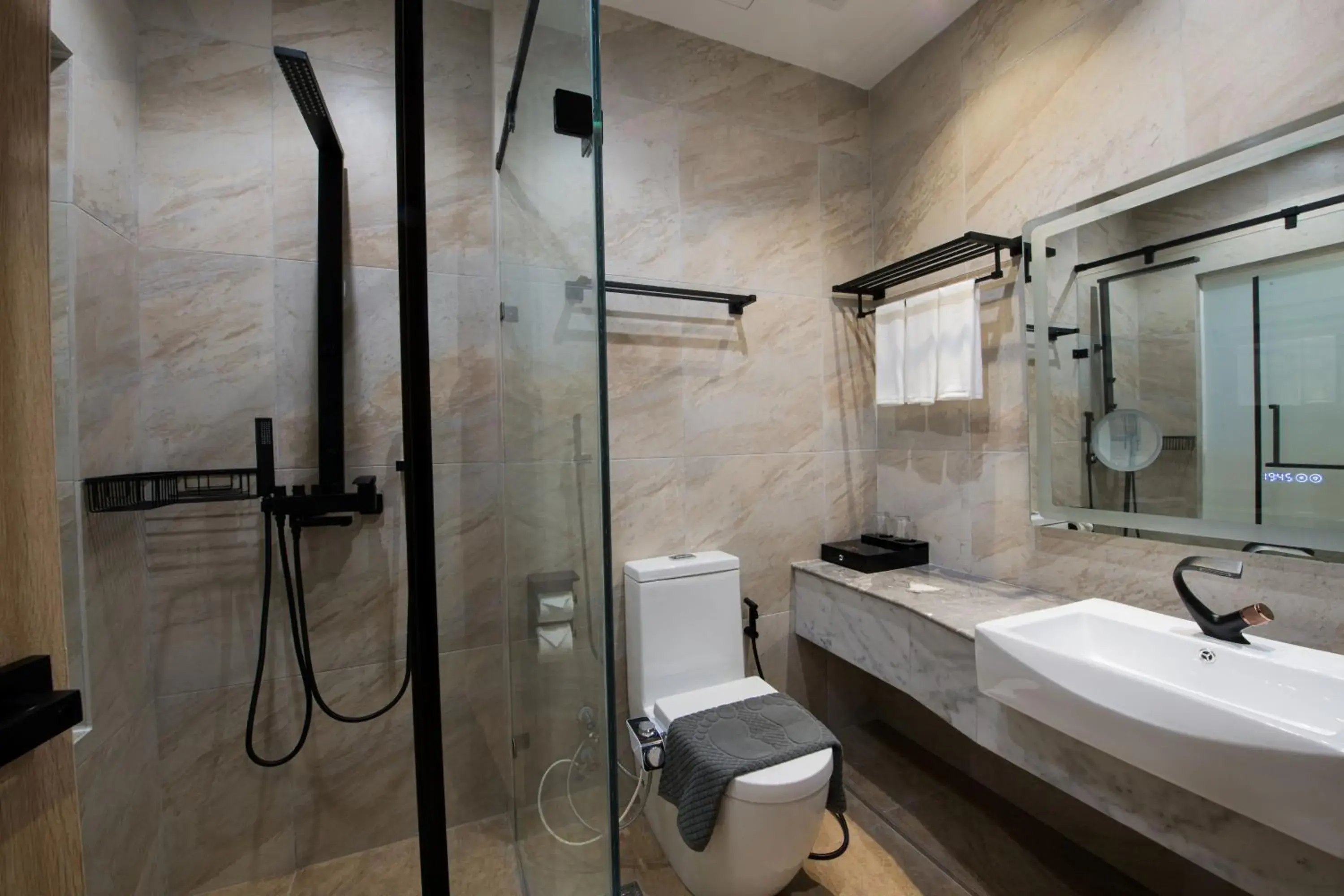 Bathroom in Grand InHotel Kota Kinabalu Bathroom in Grand InHotel Kota Kinabalu