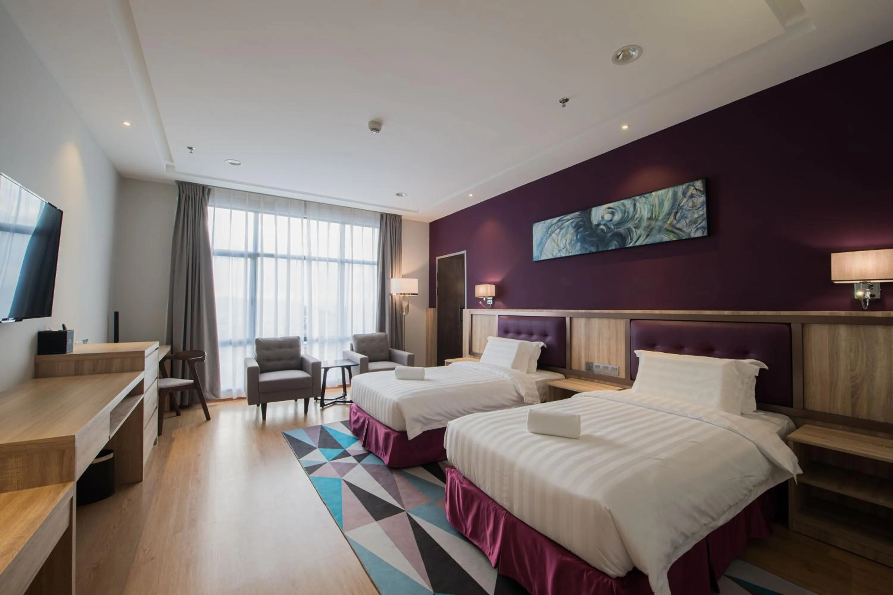 Bed in Grand InHotel Kota Kinabalu