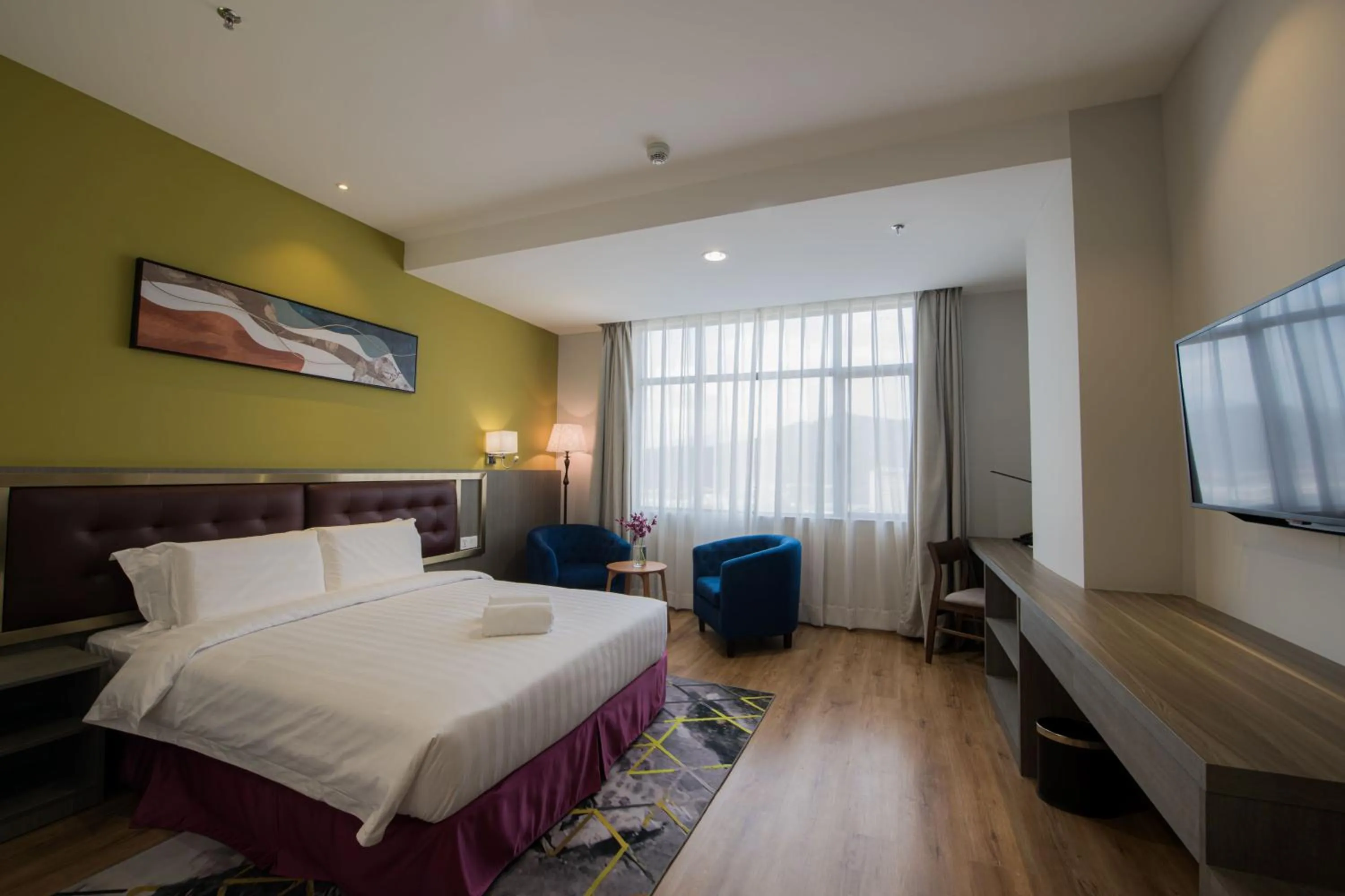 Bed in Grand InHotel Kota Kinabalu