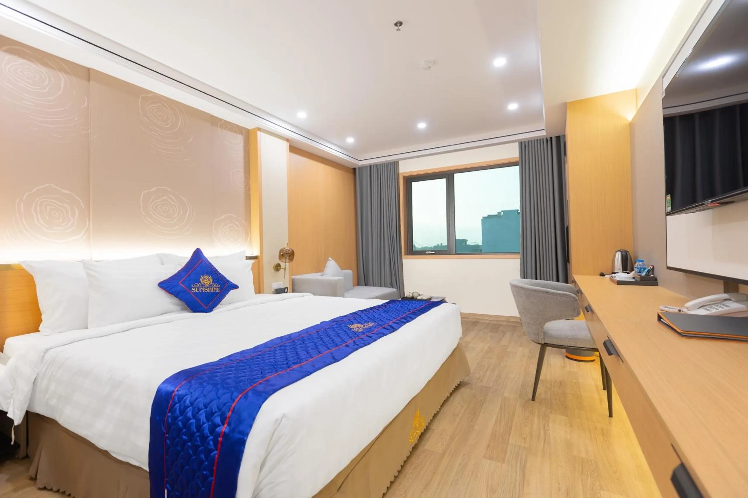 Bed in Sunshine Apartment Hotel