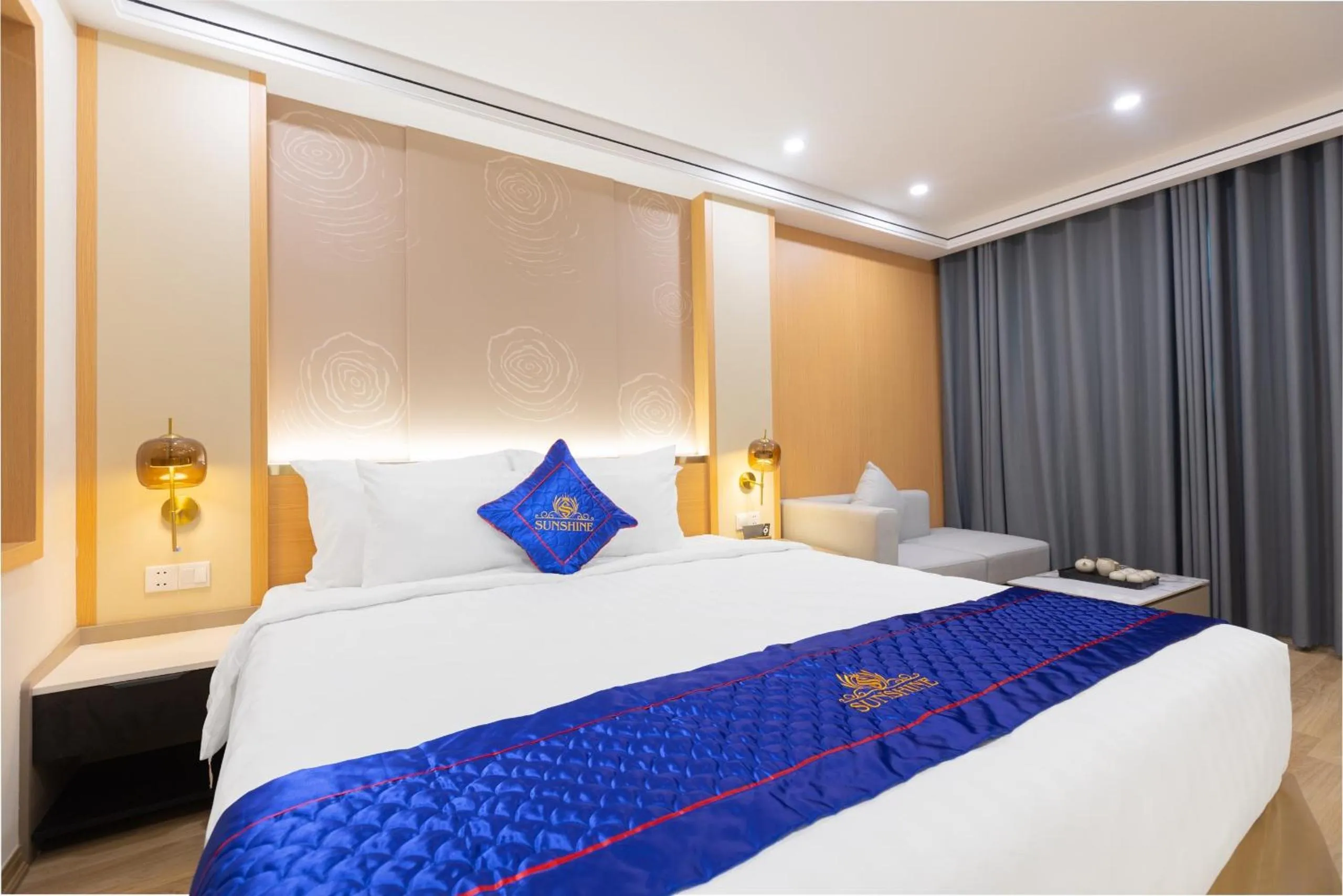 Bed in Sunshine Apartment Hotel