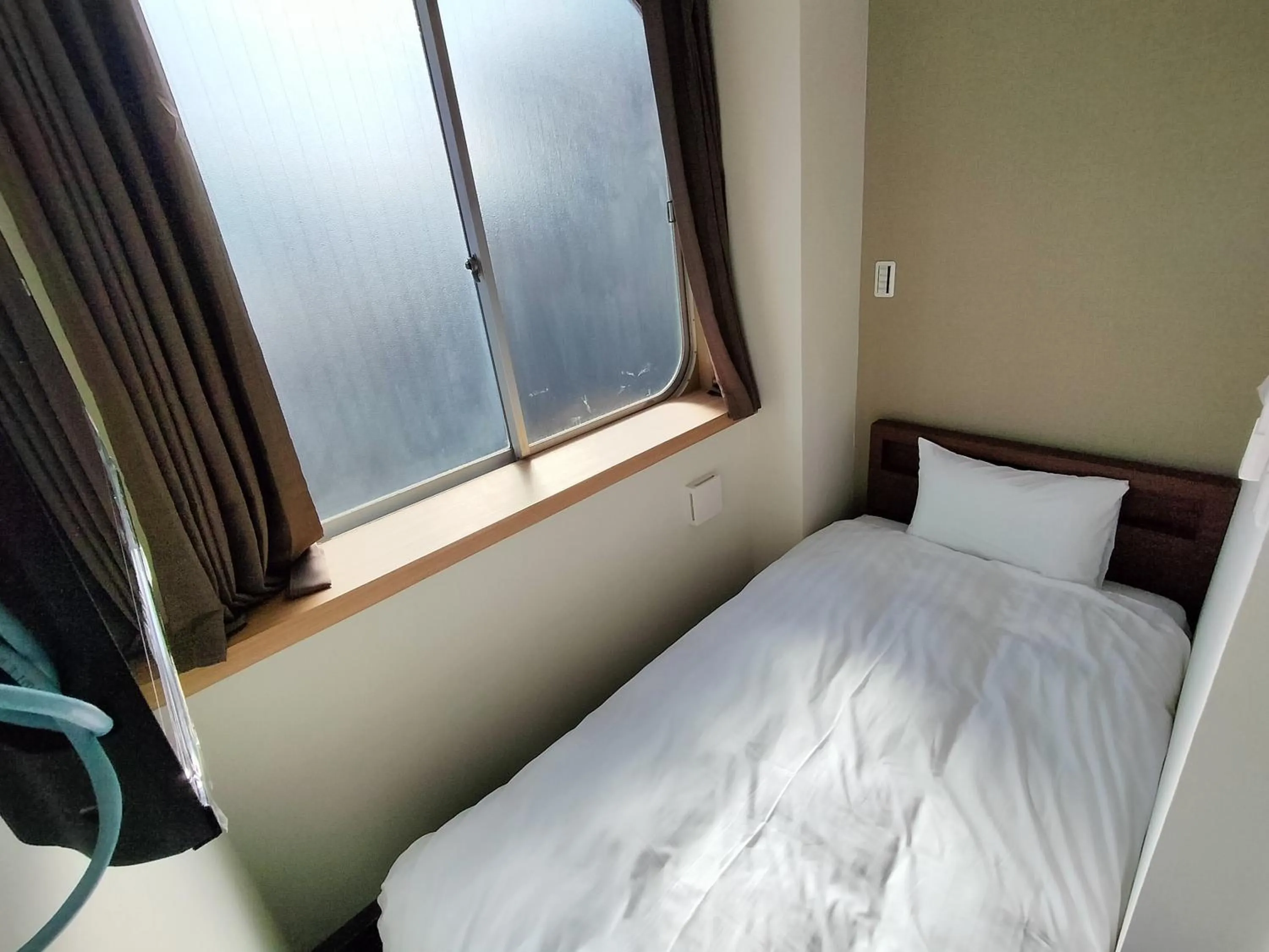 Bed in FLYCAT INN 伊勢