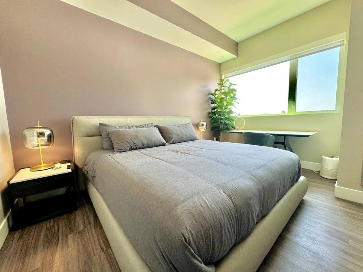 Bed in Large Hollywood Corner 2 Bedroom with Private Balcony