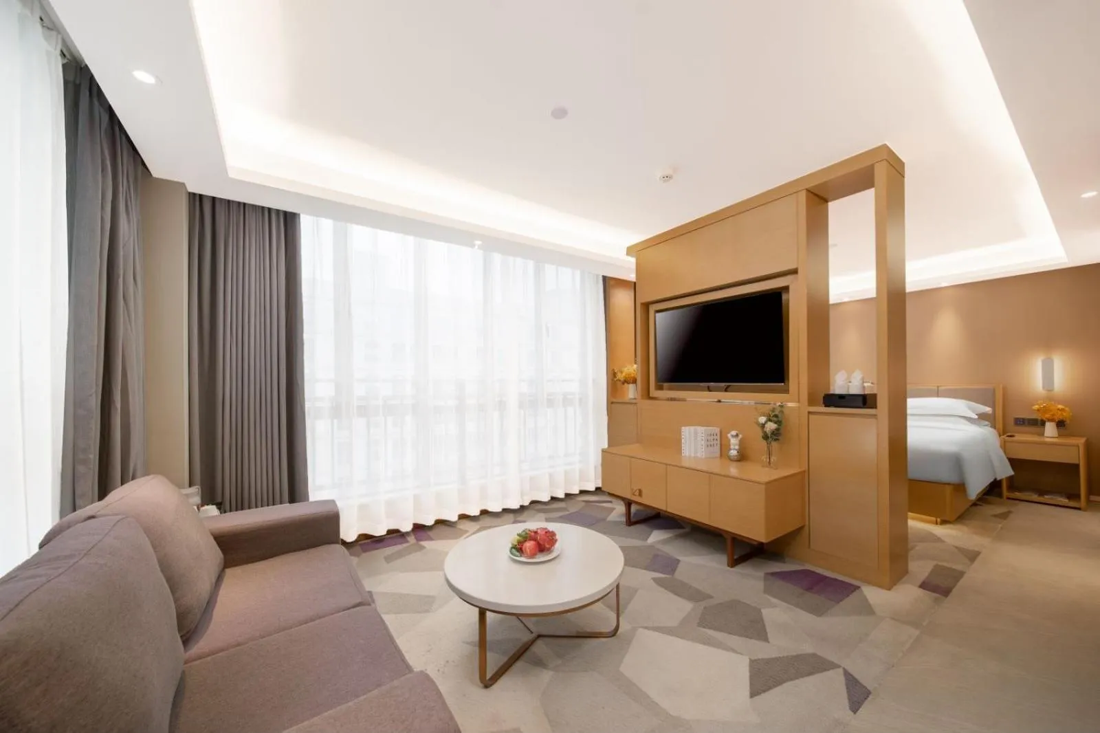 Communal lounge/ TV room, Bed in Guangzhou Baiyun Airport Yunzhi Hotel near Terminal One - Complimentary Shuttle Bus between hotel to Canton Fair Complex during Canton Fair