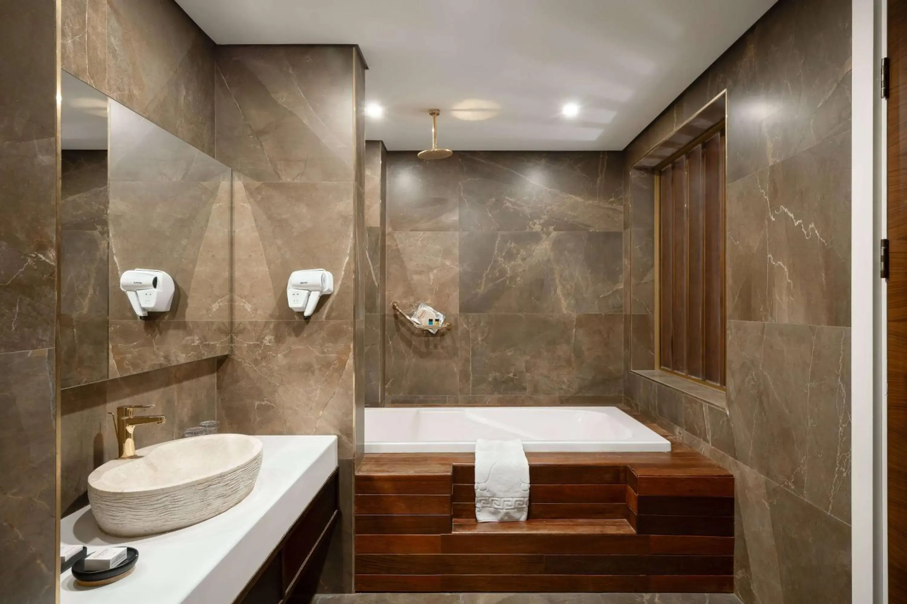 Bathroom in Ramada Hotel & Suites by Wyndham Erbil 32 Park Bathroom in Ramada Hotel & Suites by Wyndham Erbil 32 Park