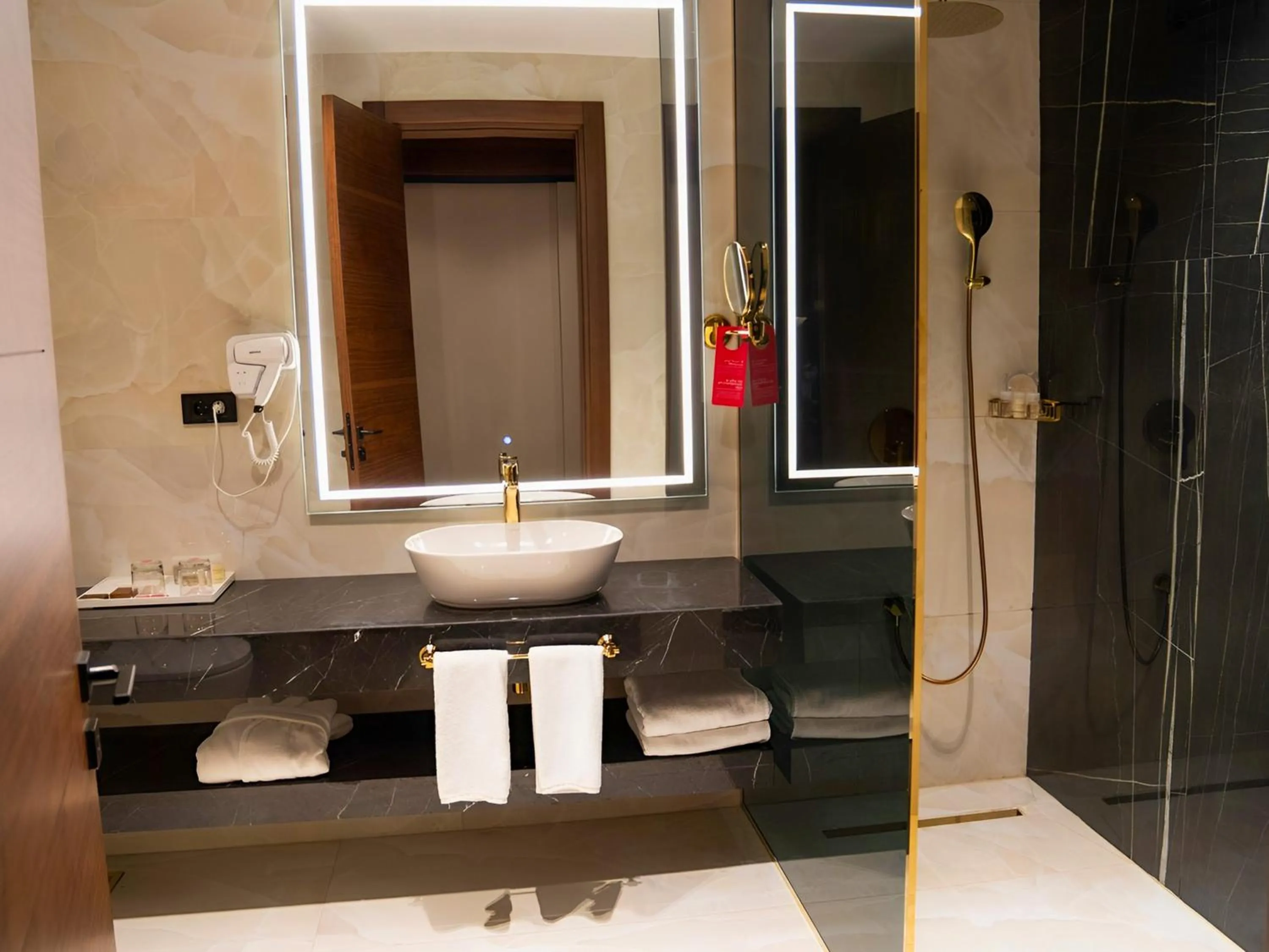 Bathroom in Ramada Hotel & Suites by Wyndham Erbil 32 Park