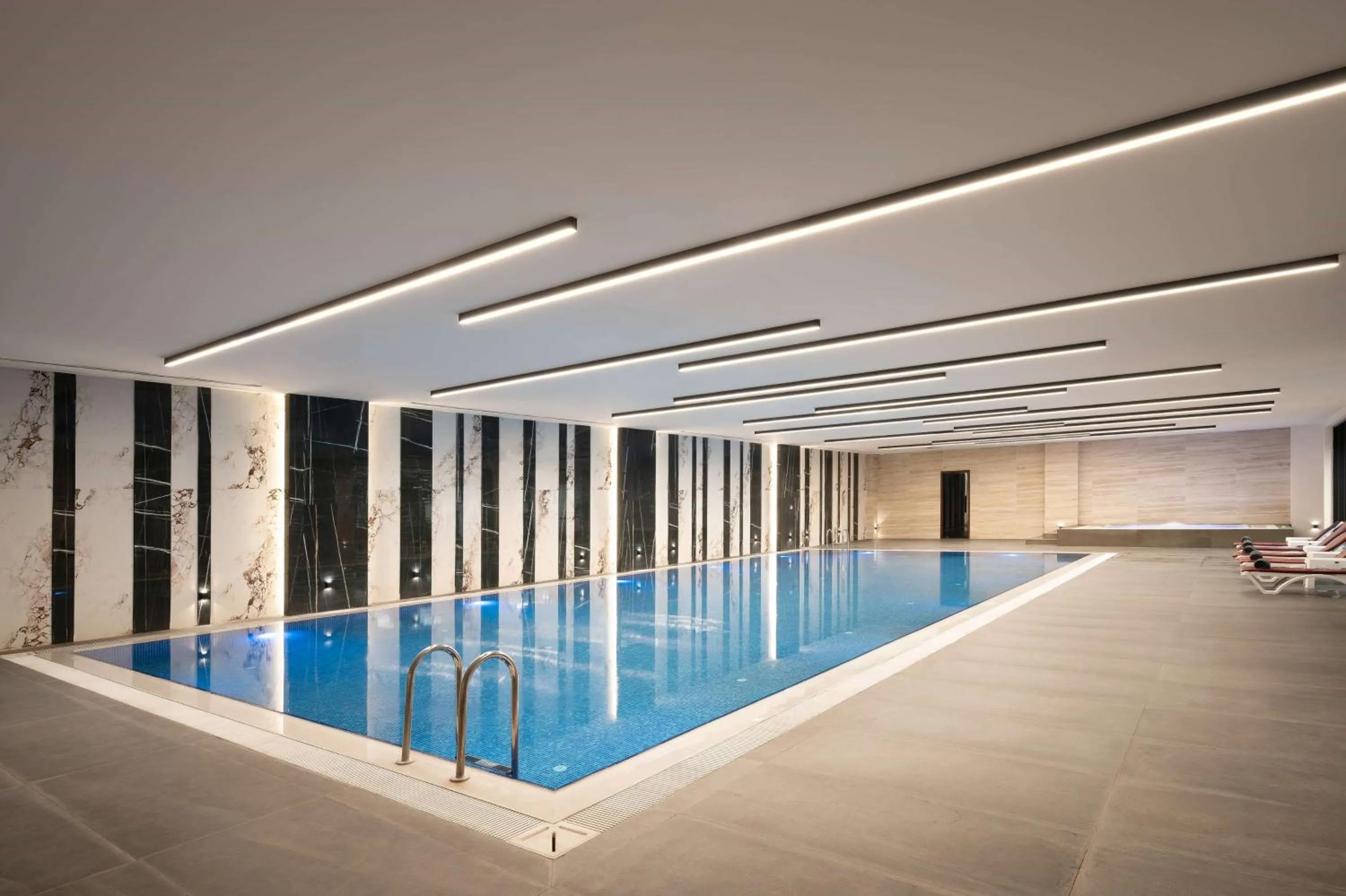 Swimming pool in Ramada Hotel & Suites by Wyndham Erbil 32 Park