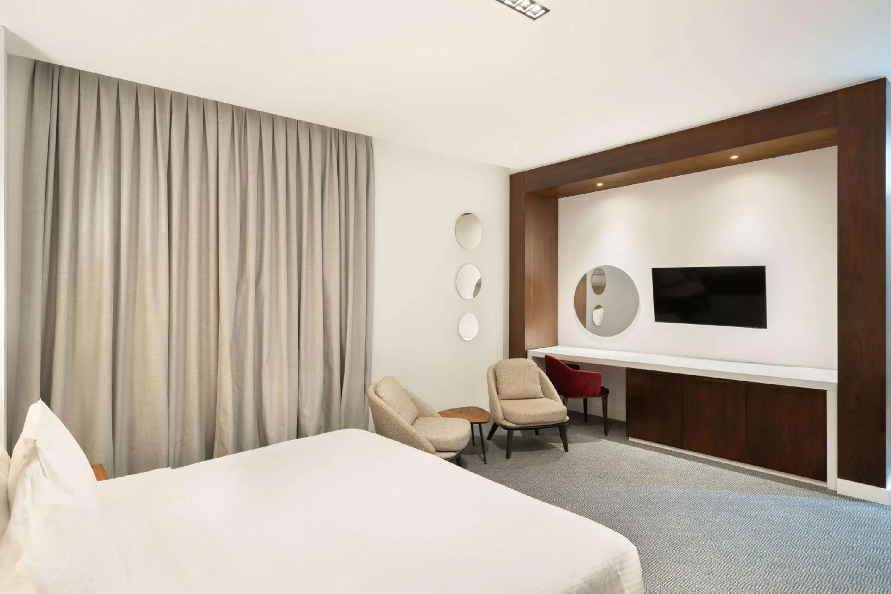 Photo of the whole room, Bed in Ramada Hotel & Suites by Wyndham Erbil 32 Park