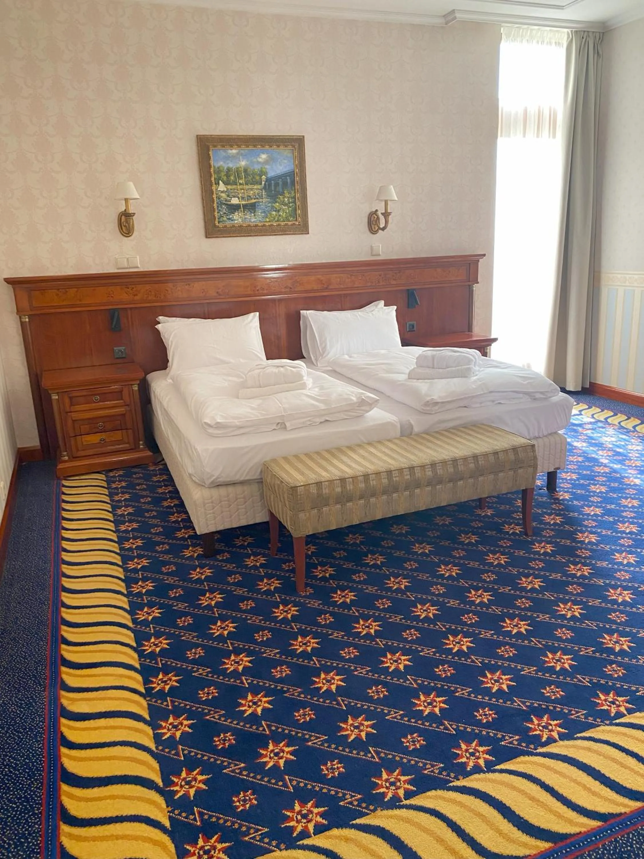 Bed in Hotel Golden Palace