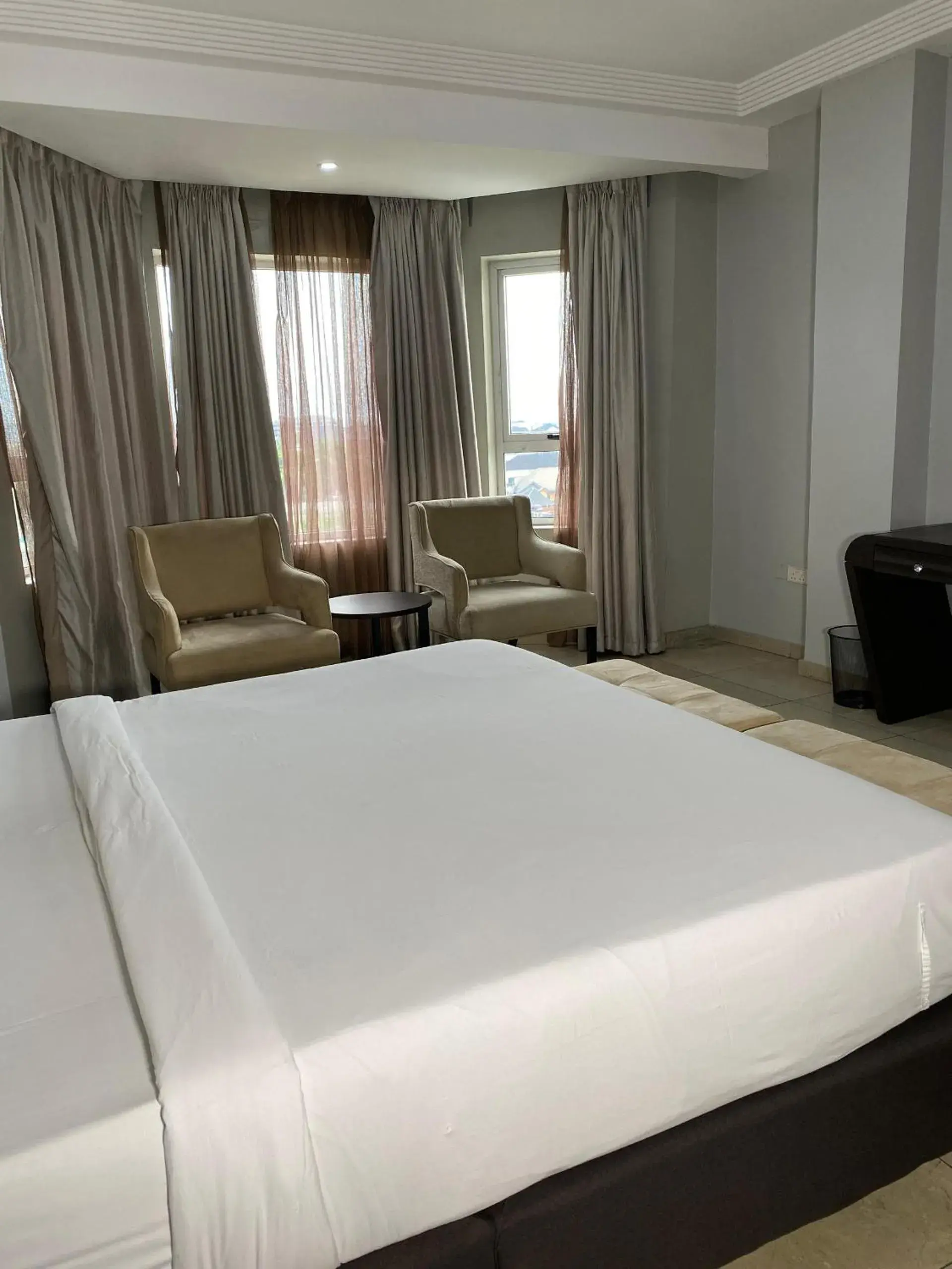 Bed in Genesis Reventon Hotel Bed in Genesis Reventon Hotel