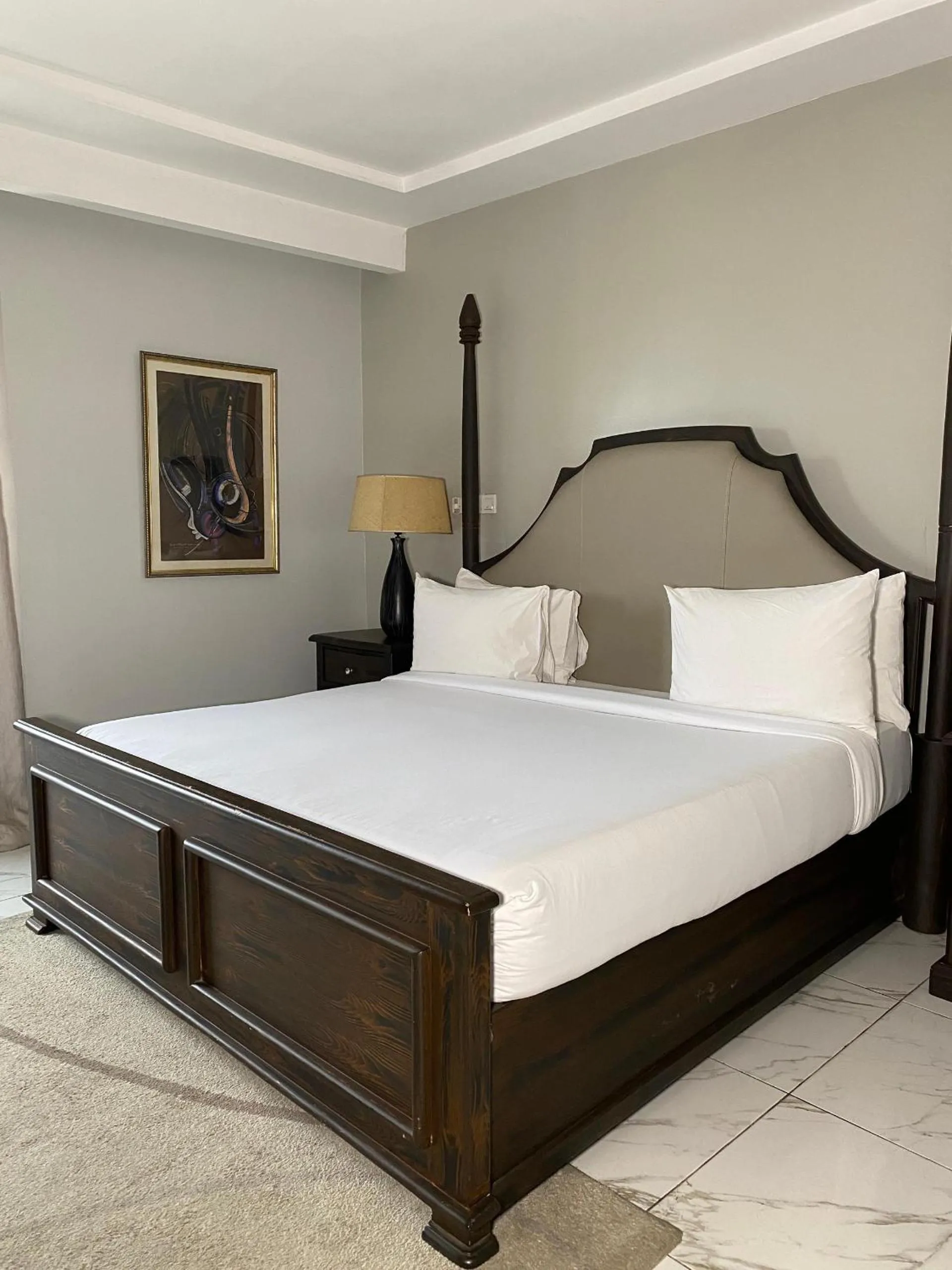 Bed in Genesis Reventon Hotel