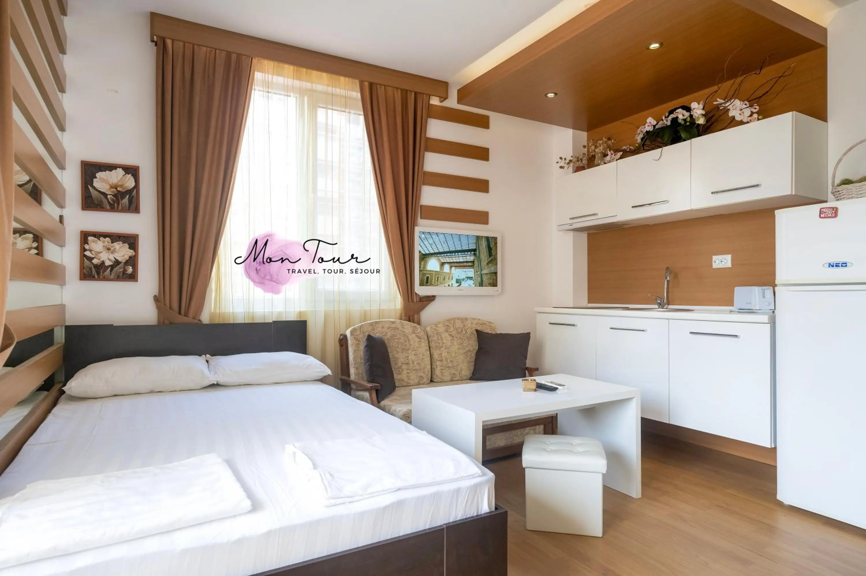 Bed in Mon Tour apartments