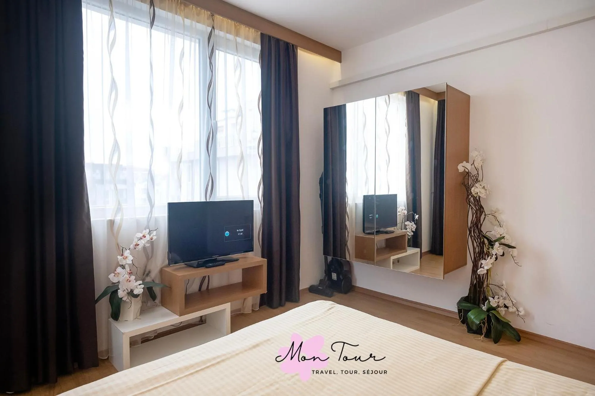 Bed in Mon Tour apartments