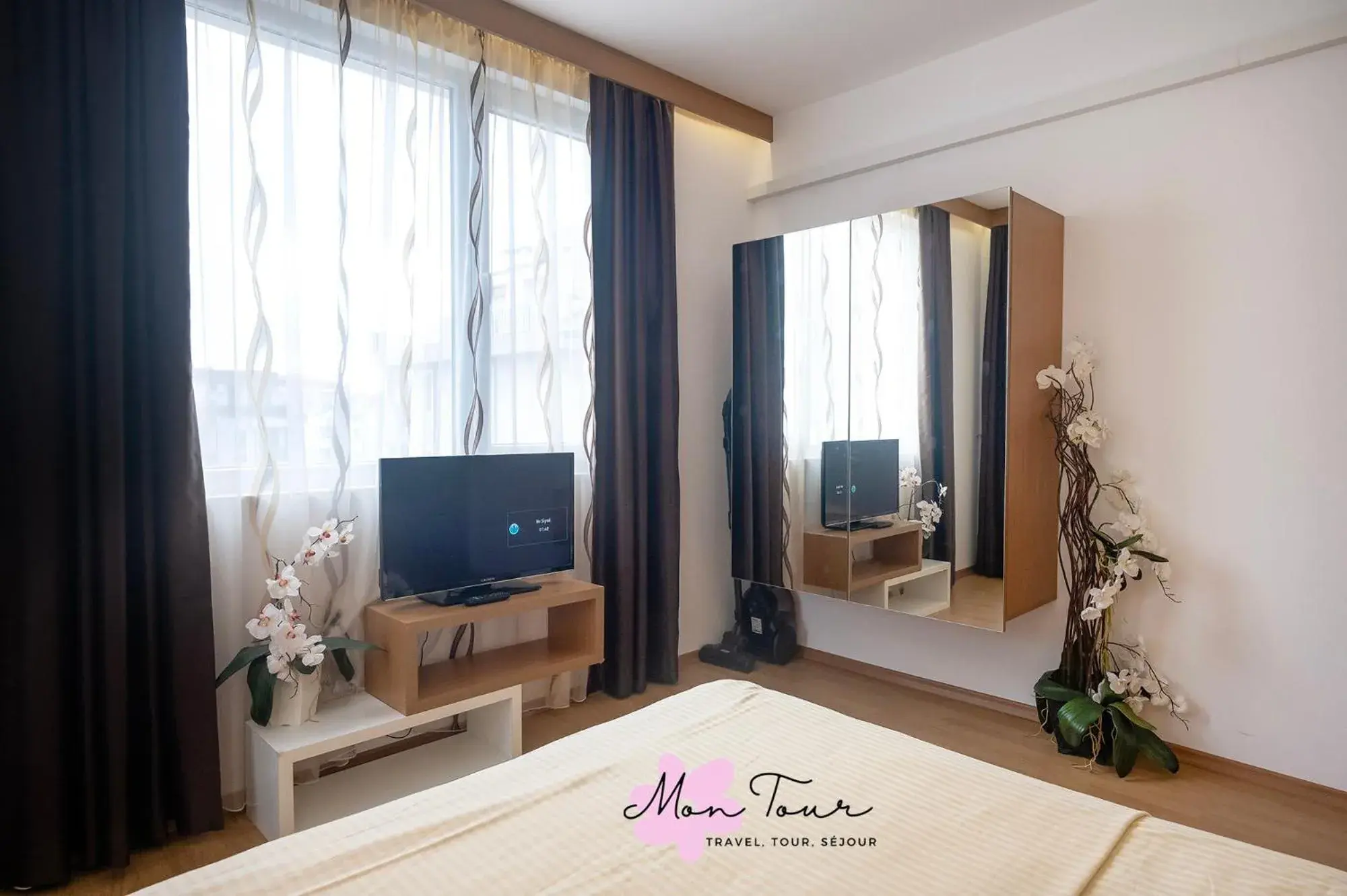 Bed in Mon Tour apartments Bed in Mon Tour apartments