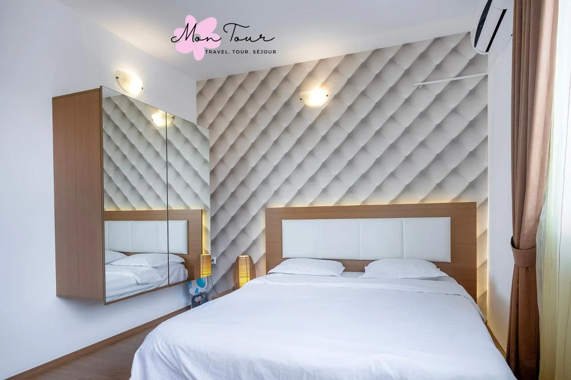 Bed in Mon Tour apartments