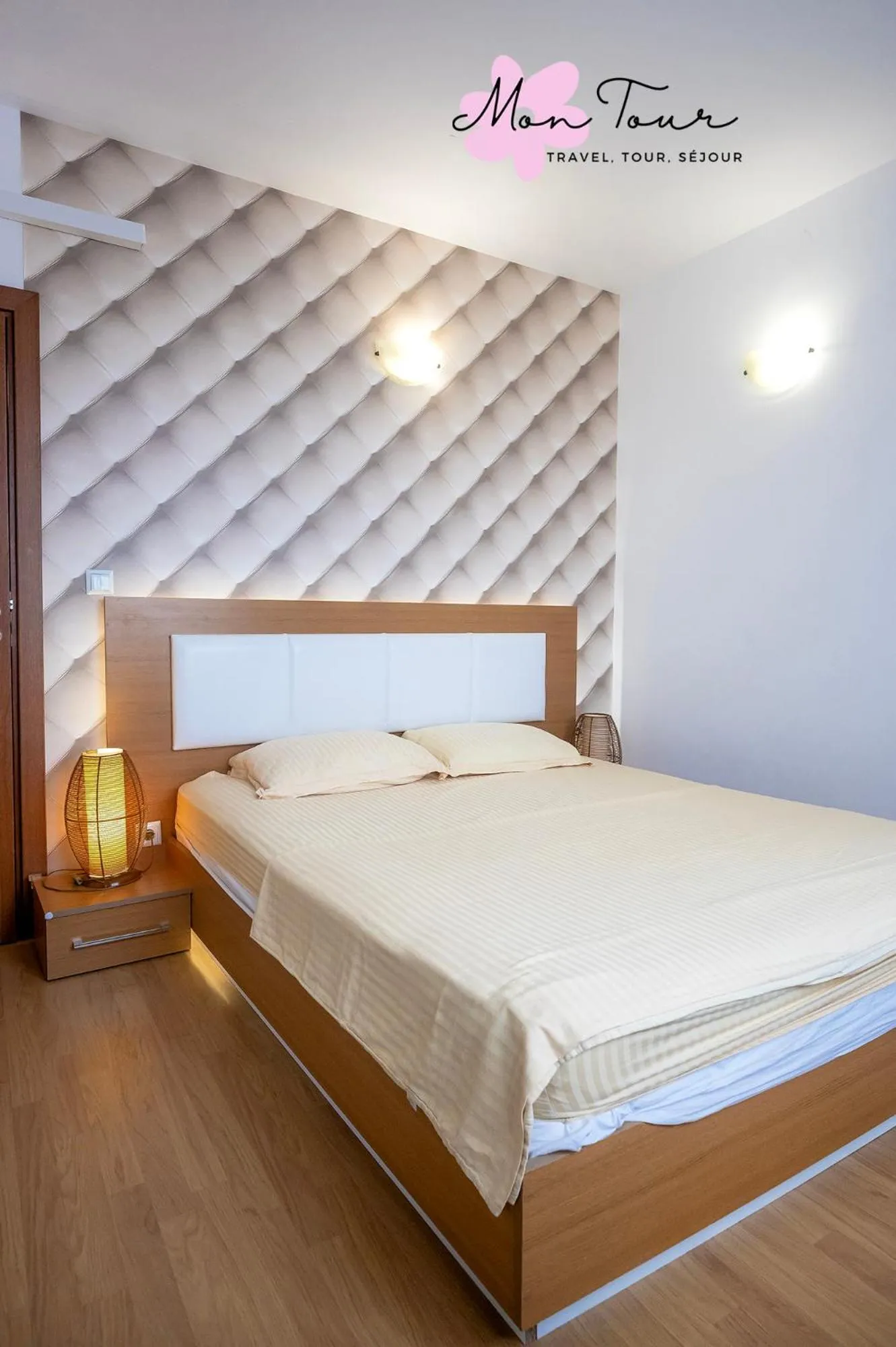 Bed in Mon Tour apartments