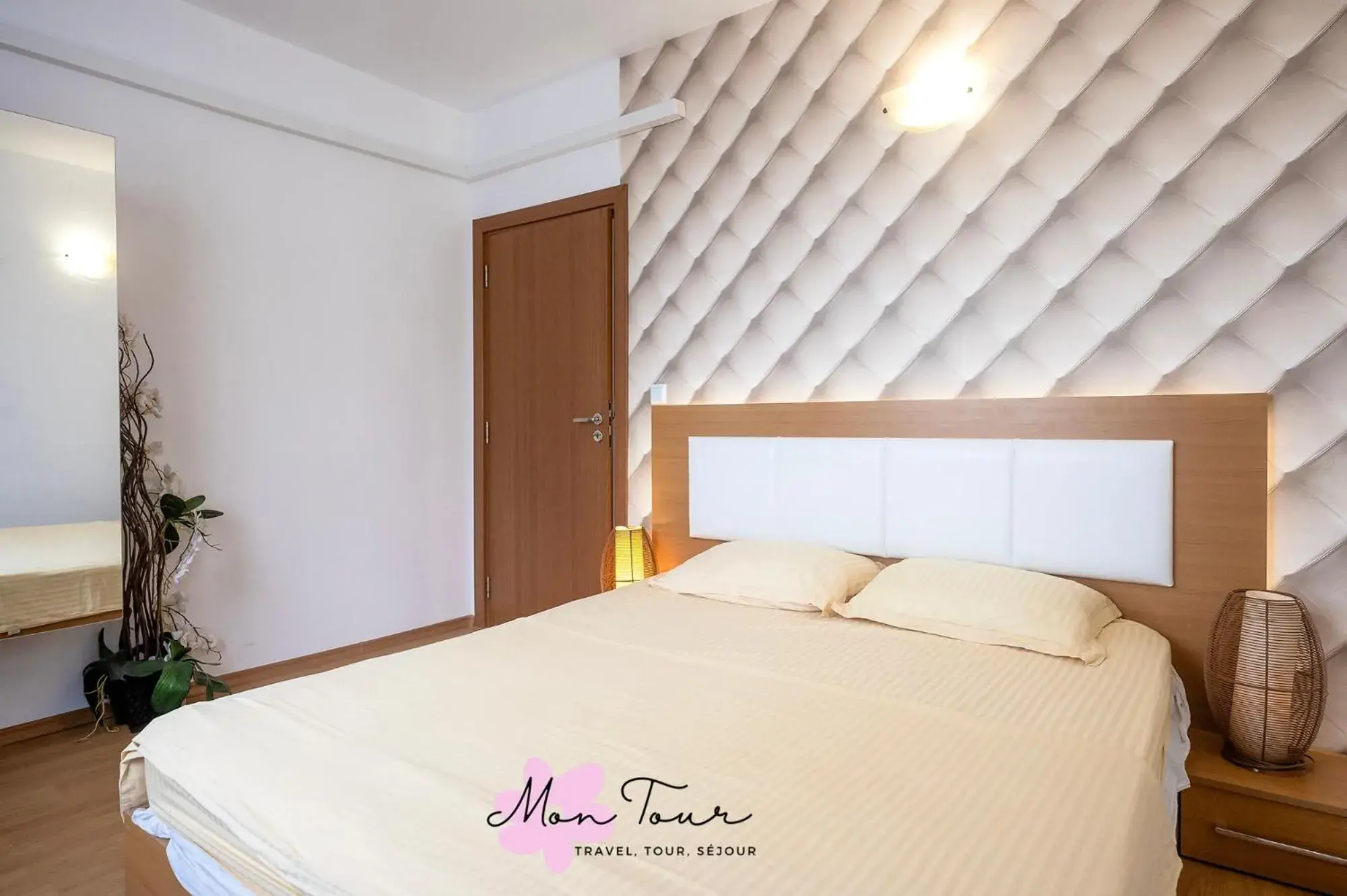 Bed in Mon Tour apartments Bed in Mon Tour apartments