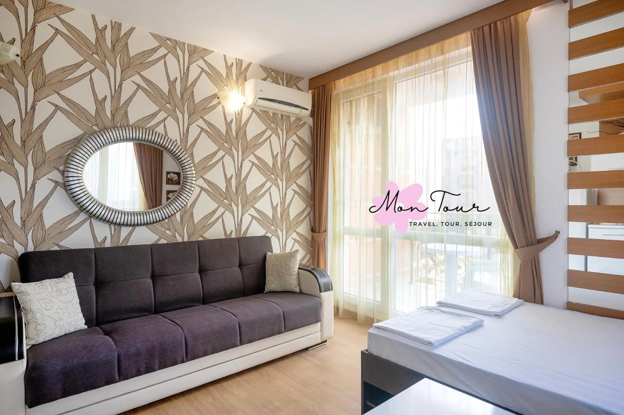 Living room, Bed in Mon Tour apartments