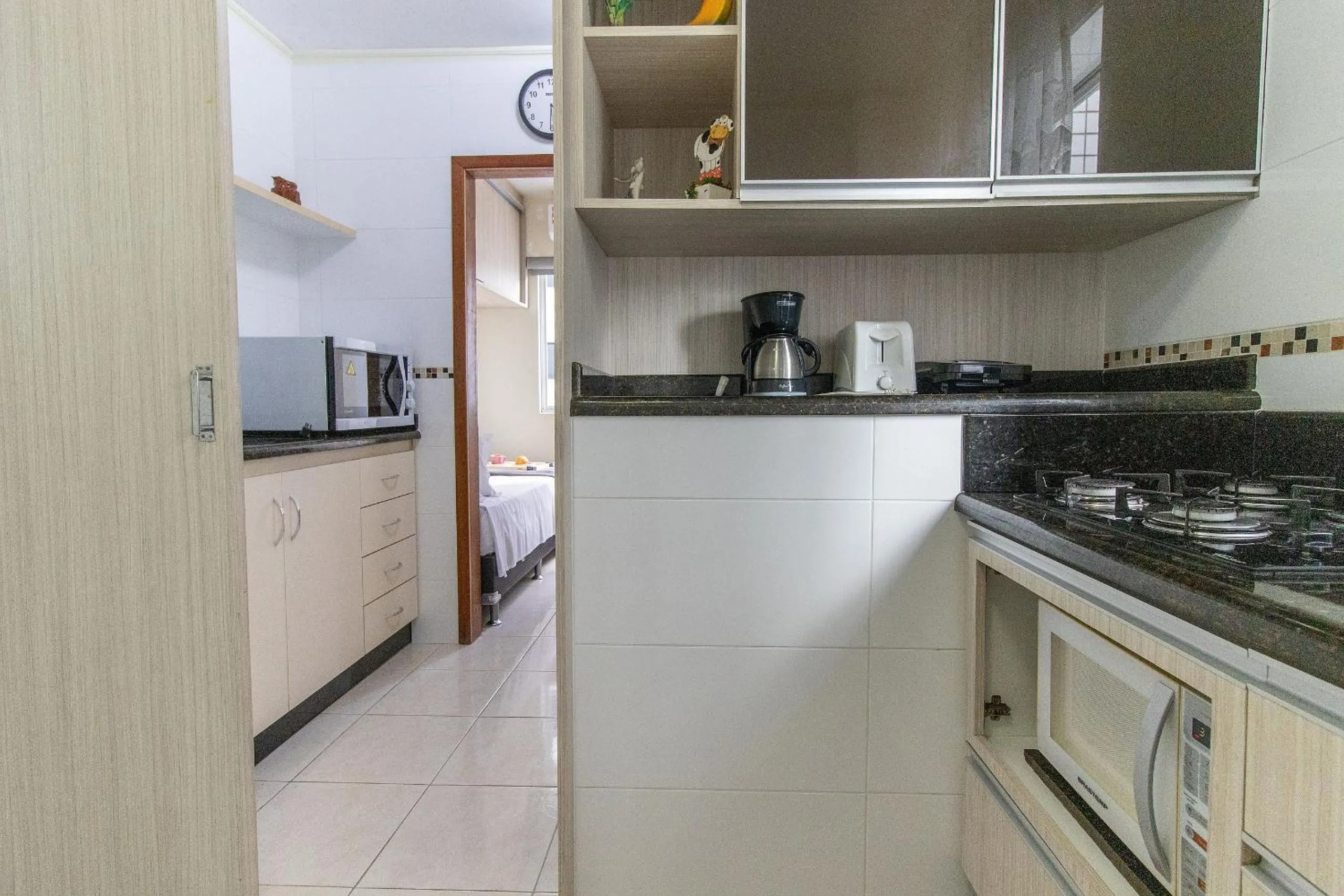 Kitchen or kitchenette in VNZ42B - Climatizado, Quadra Mar, Garagem, Wi-Fi
