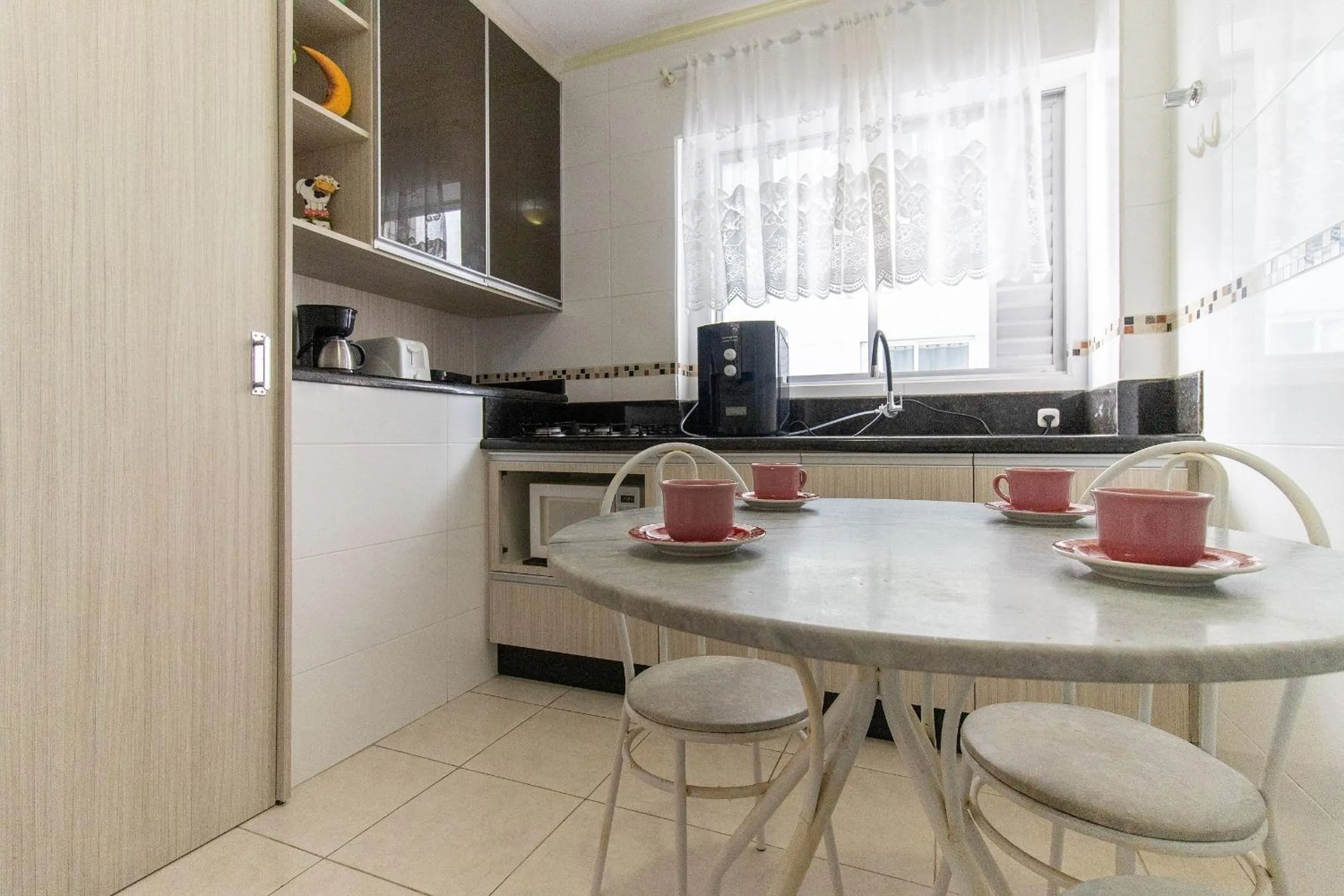 Kitchen or kitchenette in VNZ42B - Climatizado, Quadra Mar, Garagem, Wi-Fi