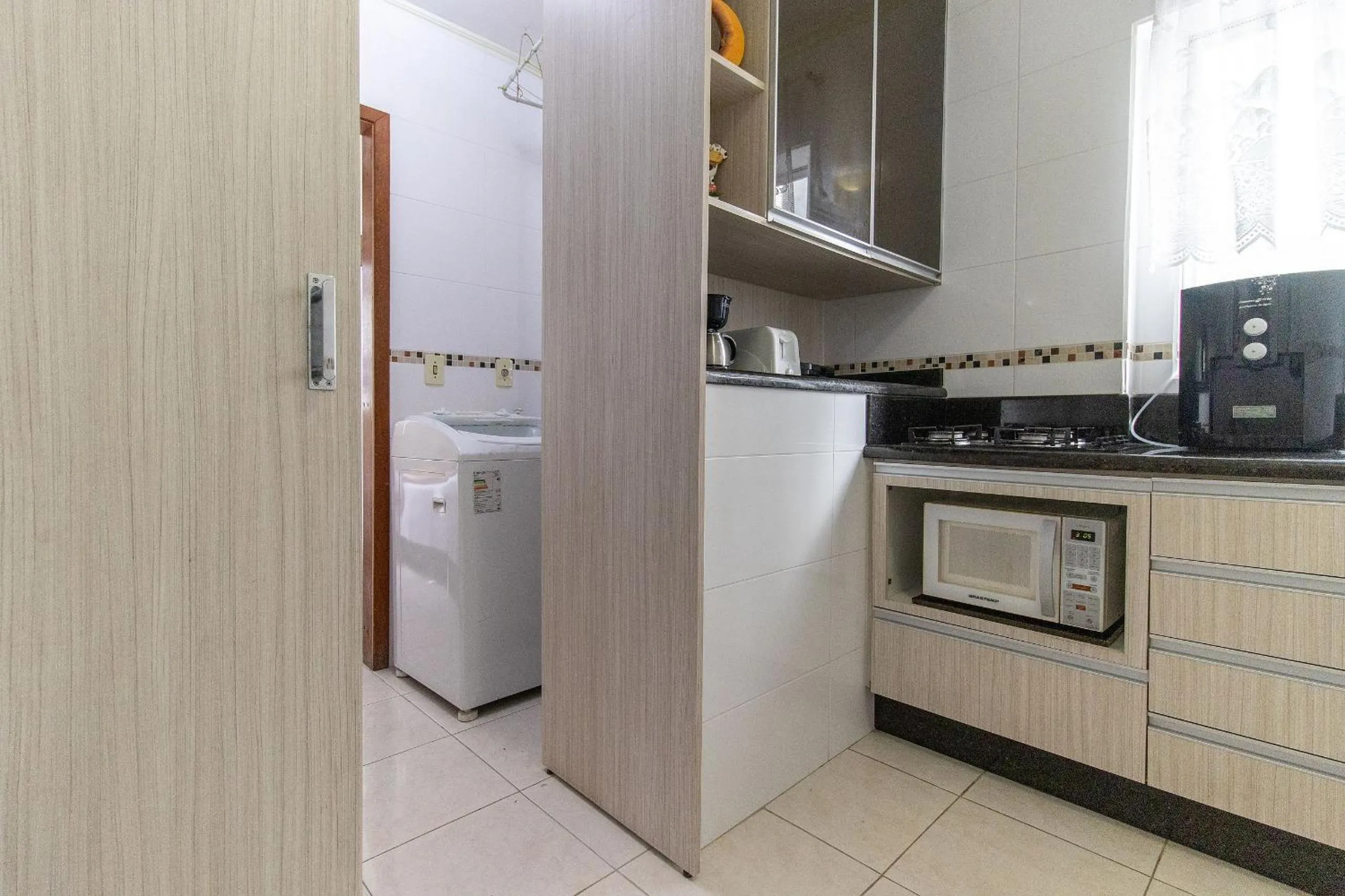 Kitchen or kitchenette in VNZ42B - Climatizado, Quadra Mar, Garagem, Wi-Fi