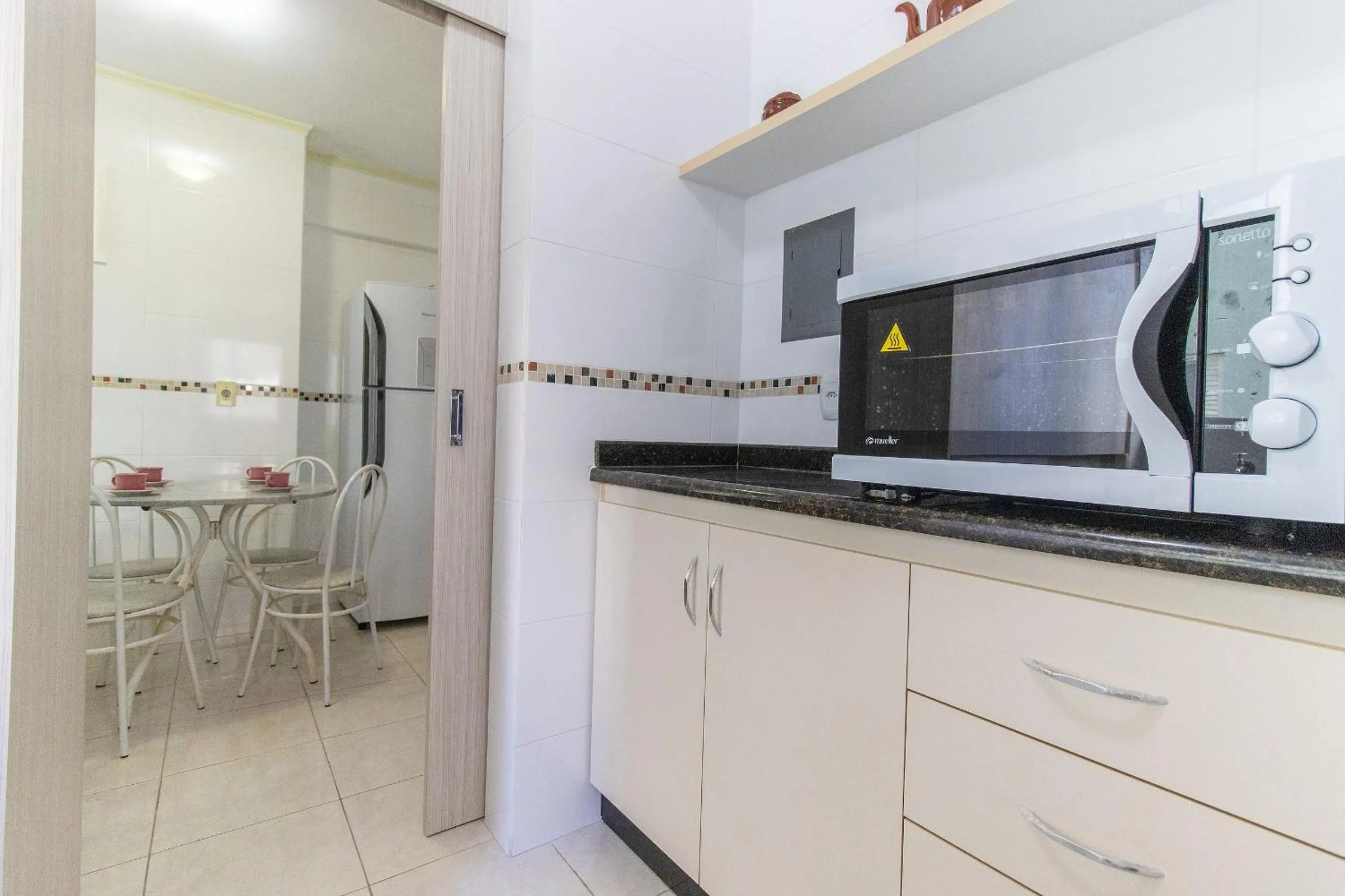 Kitchen or kitchenette in VNZ42B - Climatizado, Quadra Mar, Garagem, Wi-Fi
