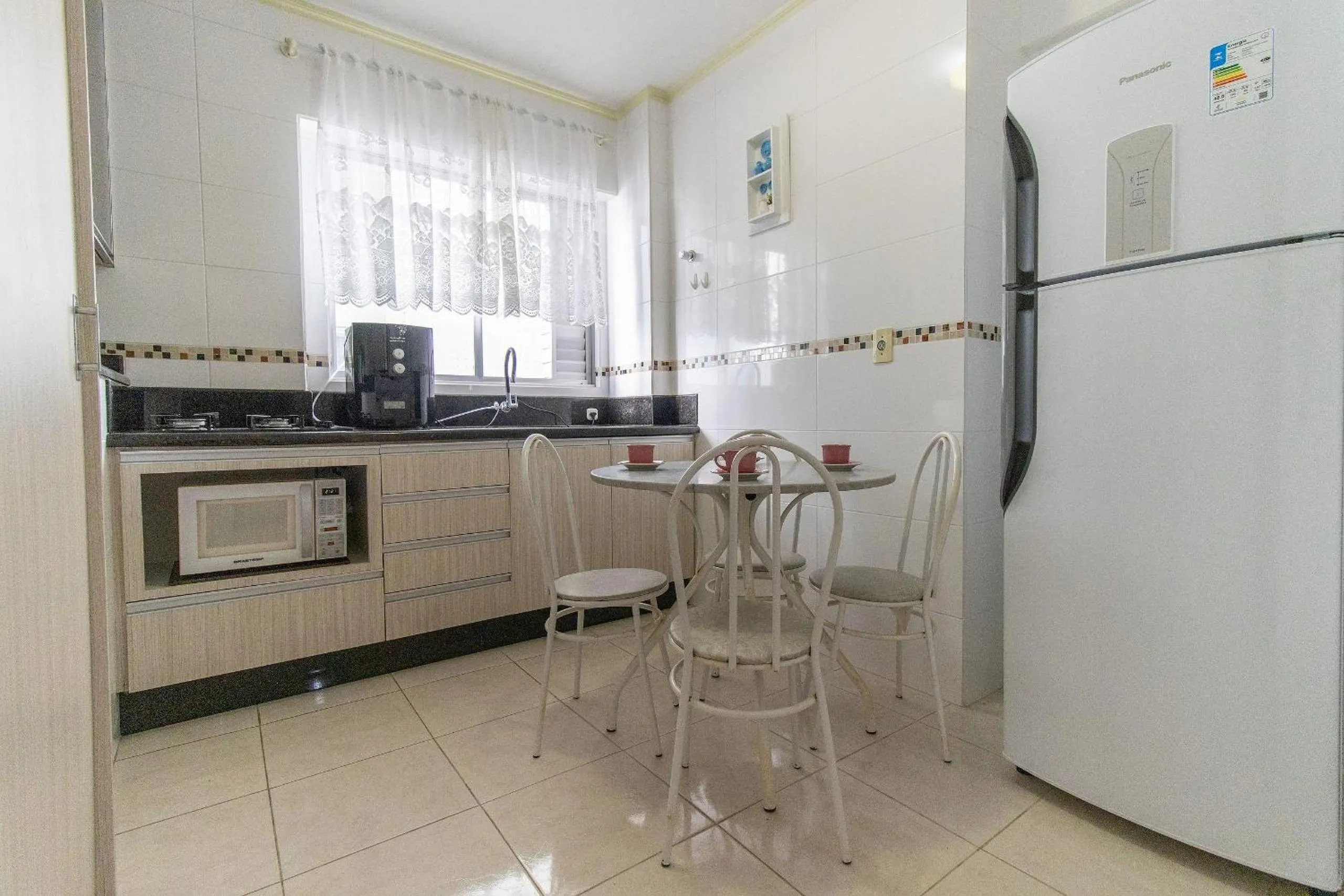 Kitchen or kitchenette in VNZ42B - Climatizado, Quadra Mar, Garagem, Wi-Fi