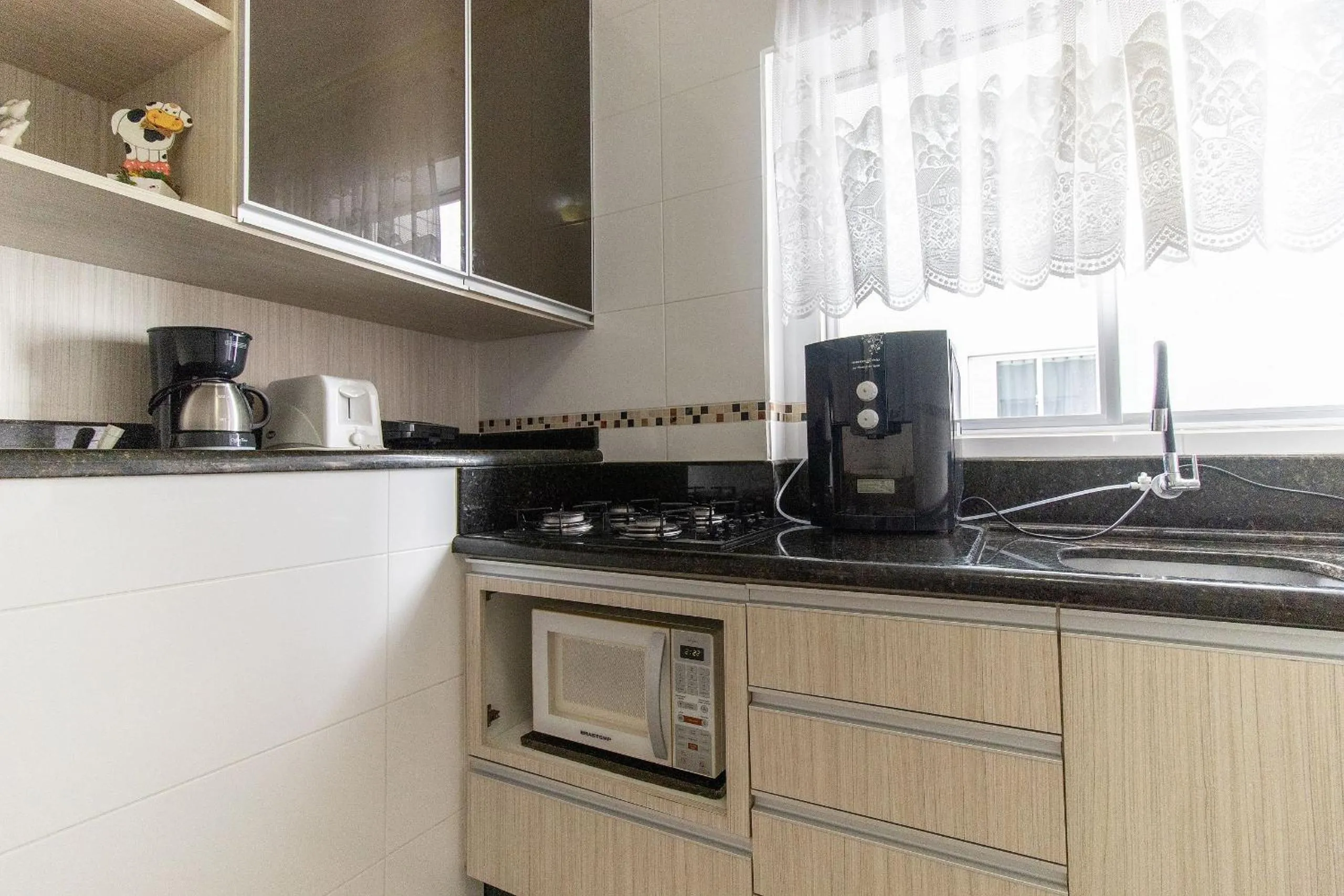 Kitchen or kitchenette in VNZ42B - Climatizado, Quadra Mar, Garagem, Wi-Fi