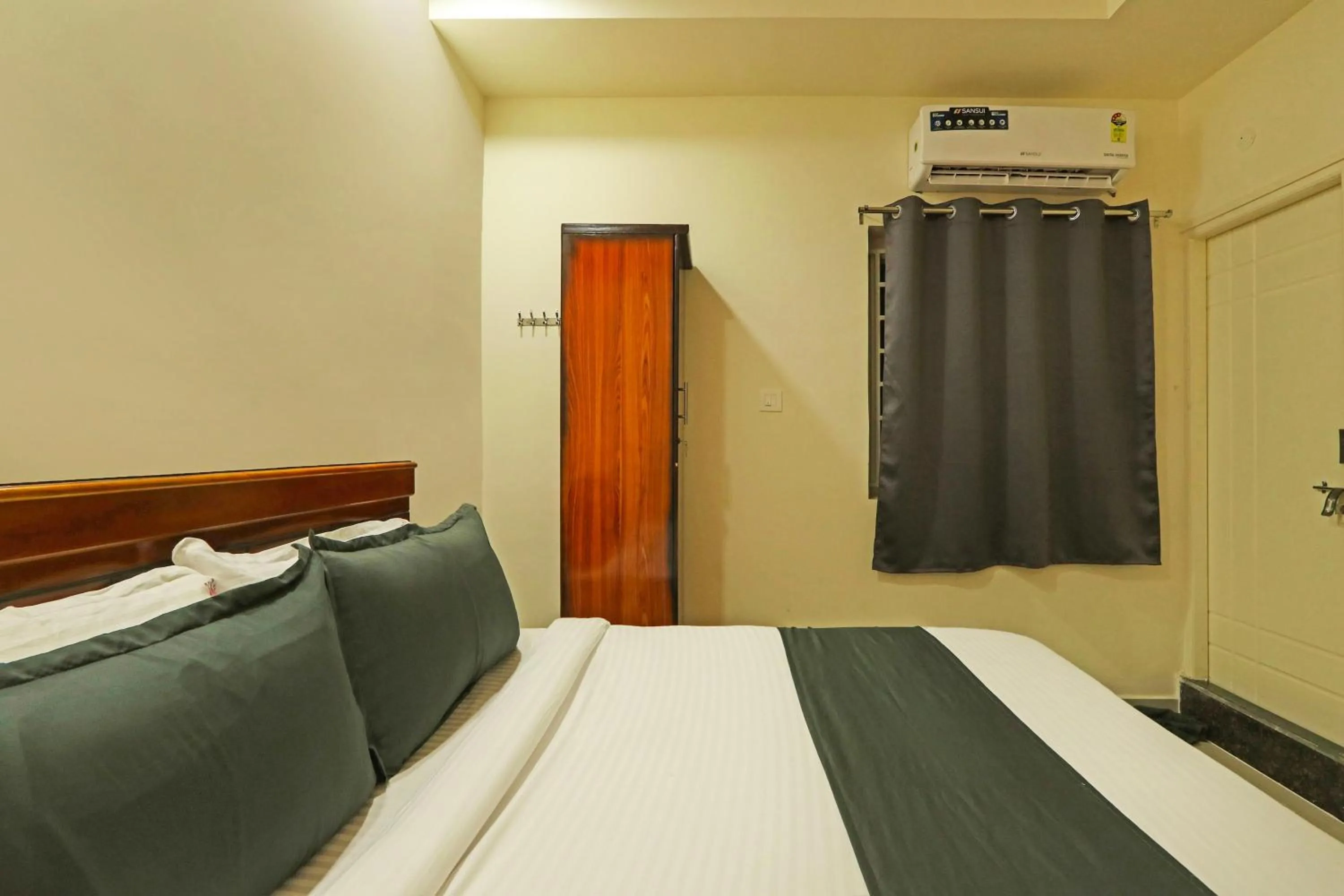 Bedroom in Hotel O JVP Hotels