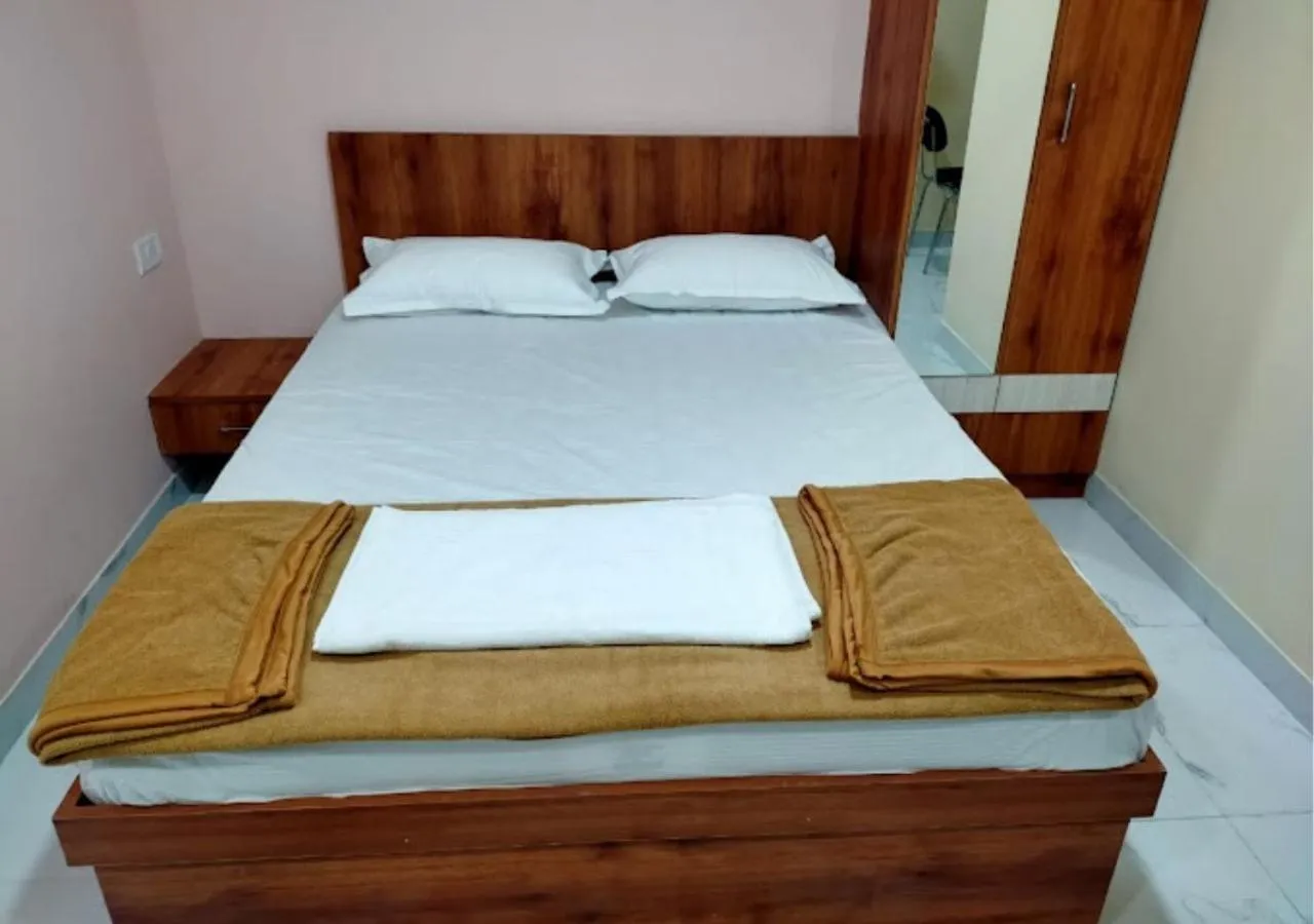 Bed in Mandara Comforts Hotel