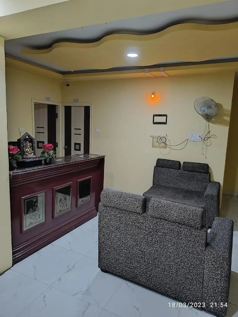 Seating area in Mandara Comforts Hotel