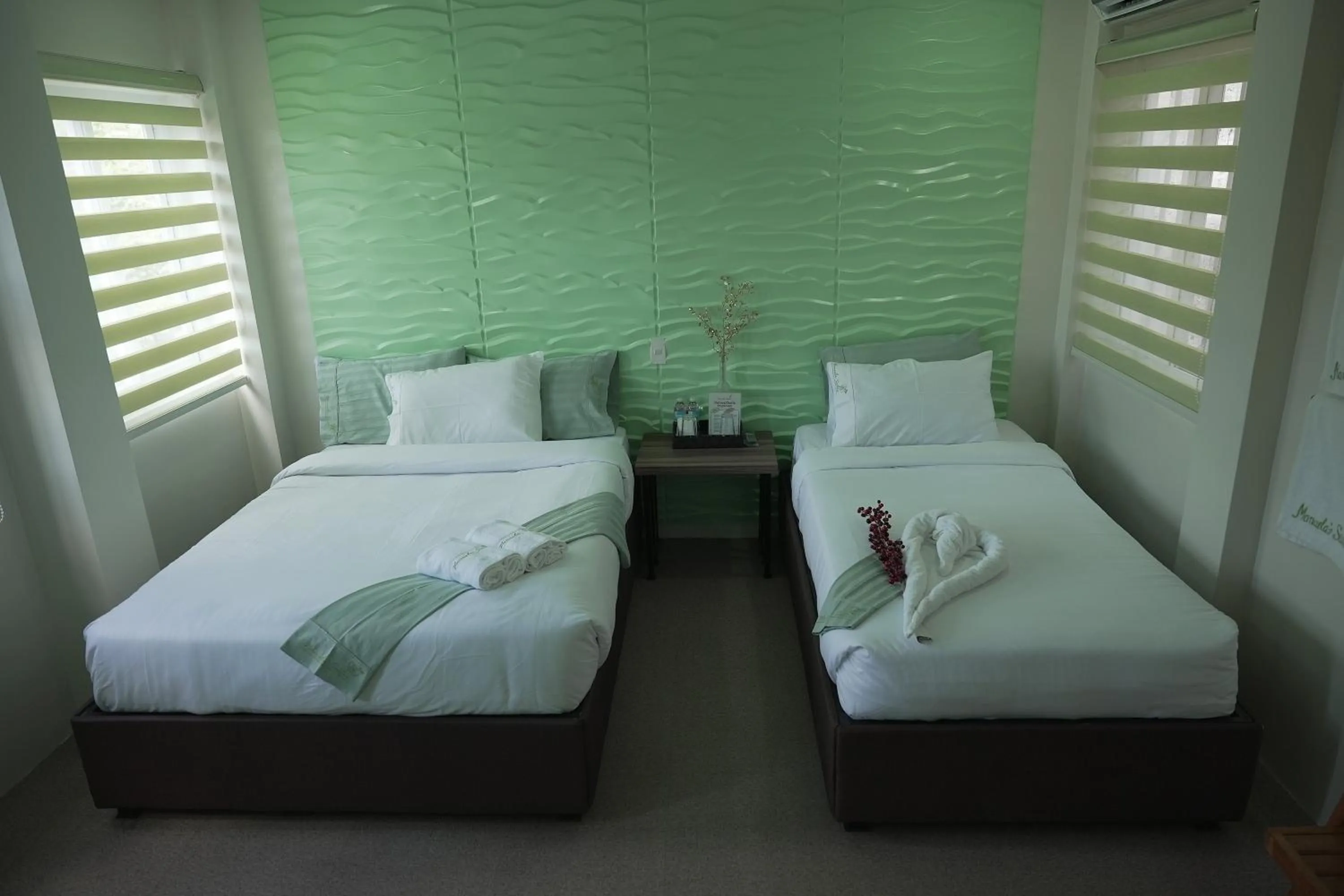 Bed in Manuela Suites Puerto Princesa near Airport
