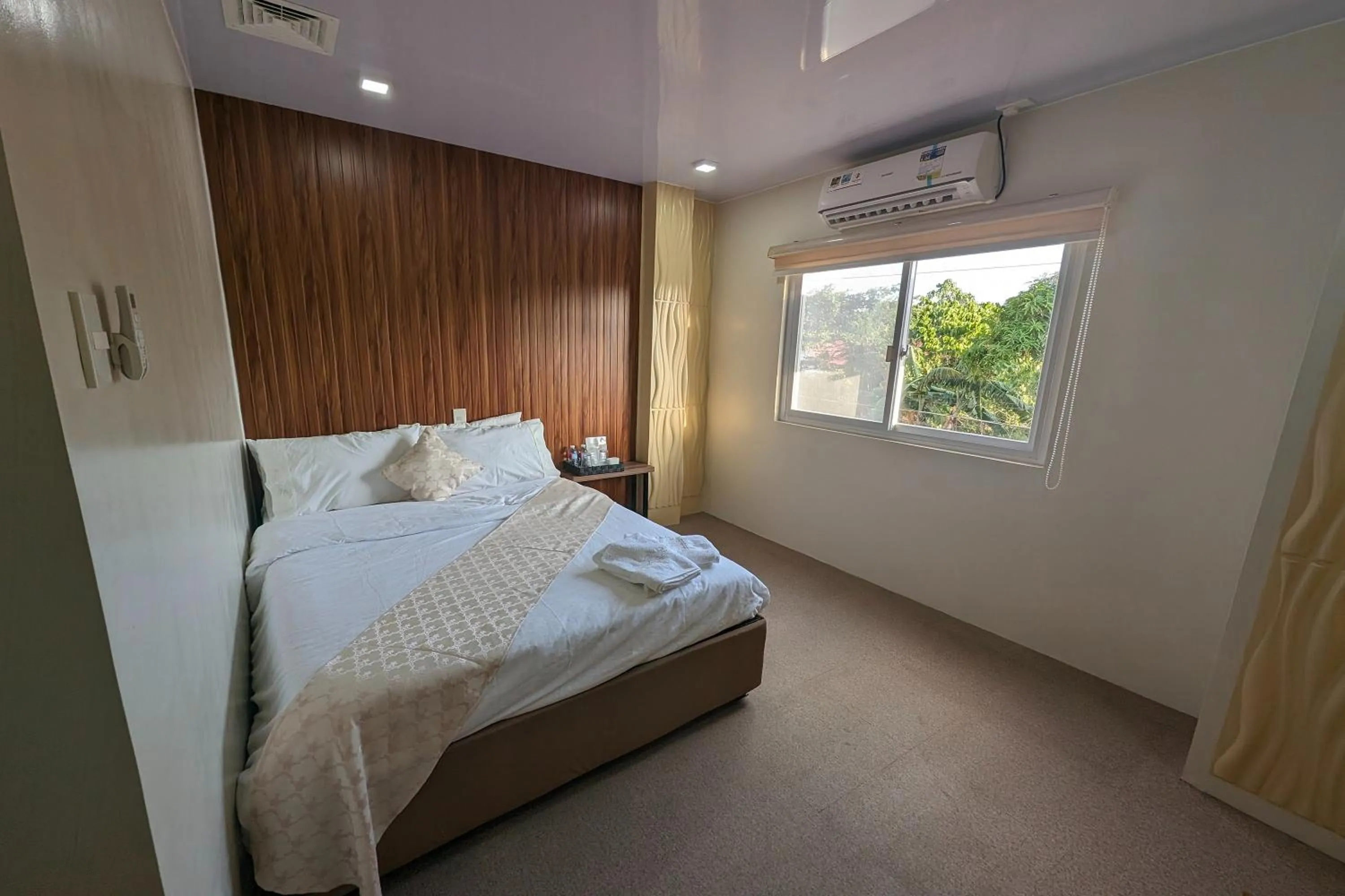 Bed in Manuela Suites Puerto Princesa near Airport