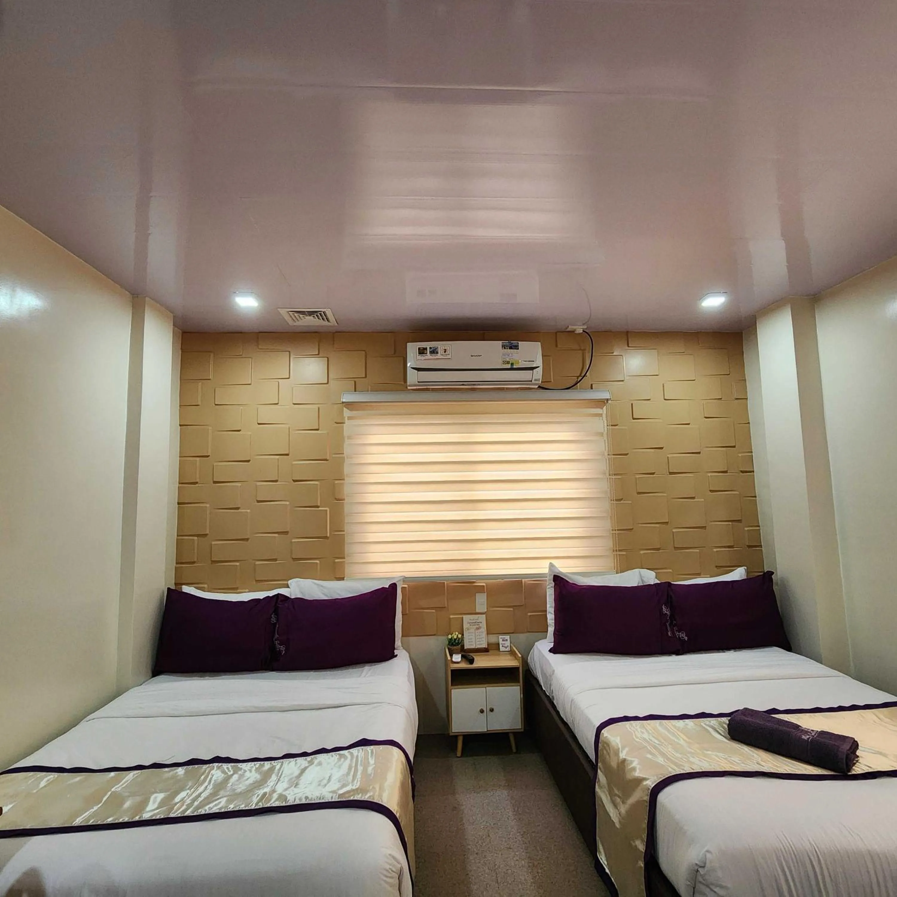 Bedroom, Bed in Manuela Suites Puerto Princesa near Airport