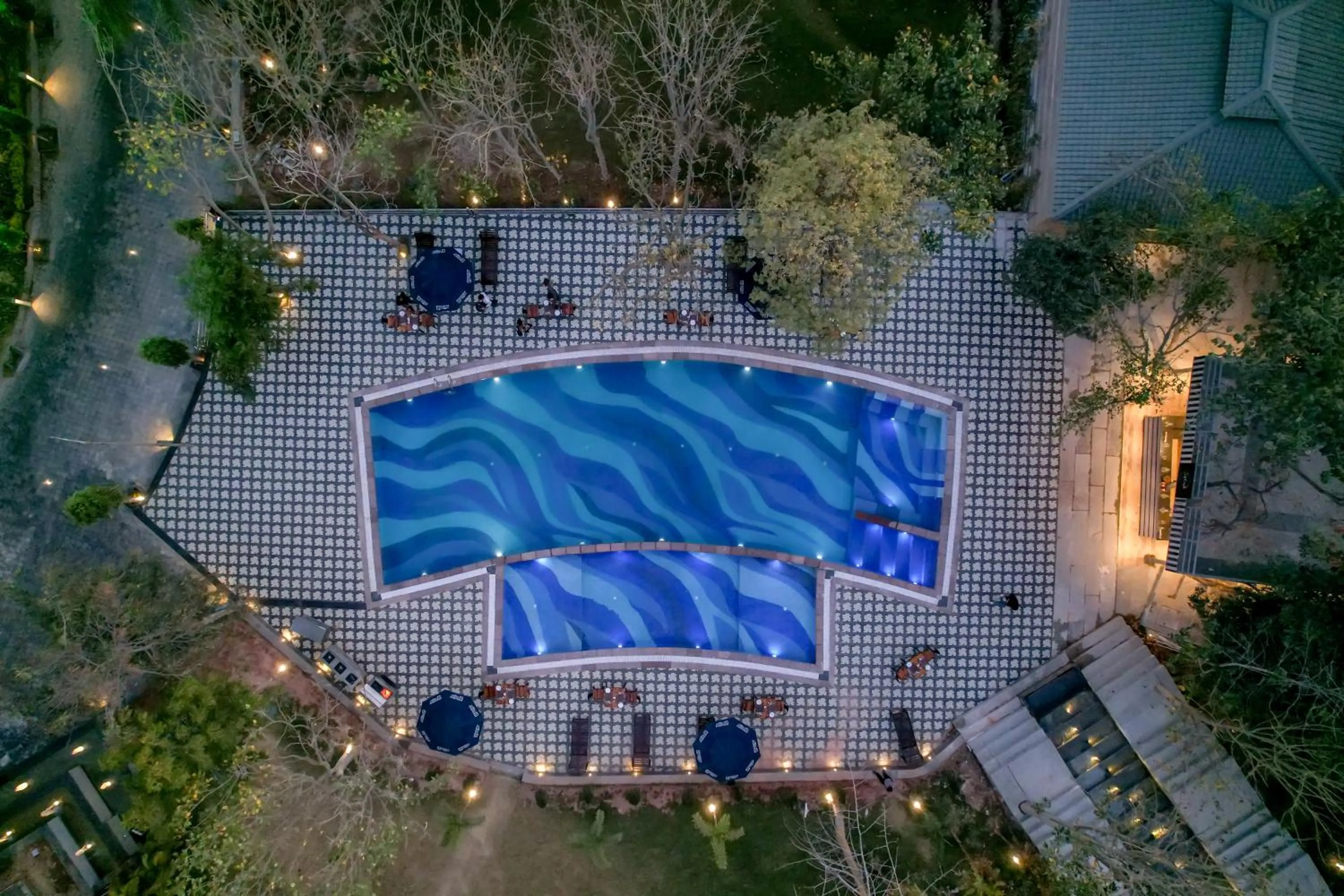 Swimming pool in Essentia Luxury Resort & Spa Udaipur